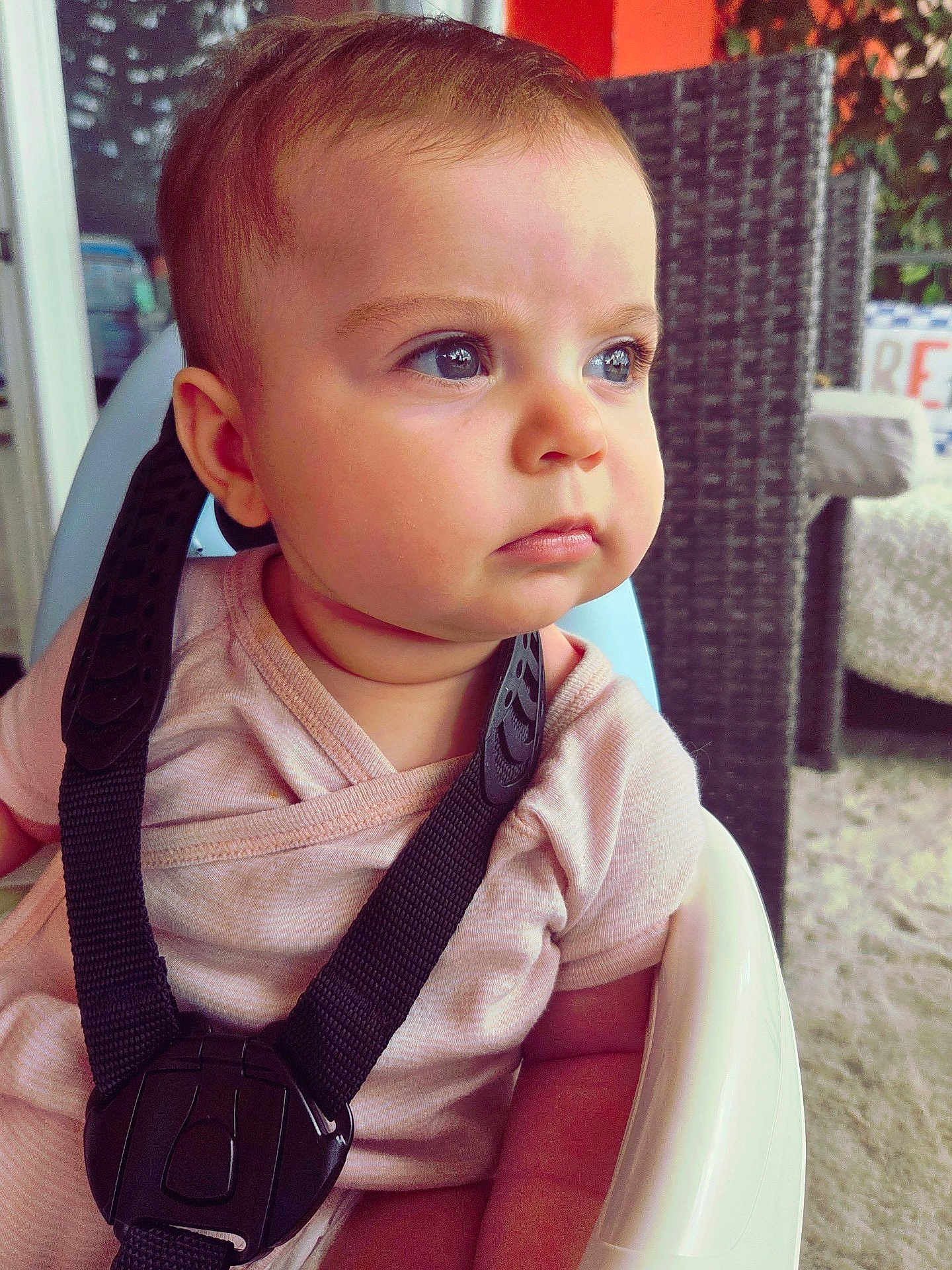 Hanaé a rejoint le concours — aidez-le/la à gagner de superbes lots ! baby, child, face, high_chair, straps, curious, indoors, person, closeup, skin, clothing, seat, safety, expression, infant, portrait, cute, young, head, looking_away