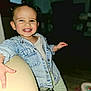 Kélaya participe au concours pour gagner de l'argent avec cette photo : toddler, child, smiling, denim_jacket, indoor, face, person, happy, clothing, pigtails, pants, polka_dot, furniture, blurred_background, hand, cute, joyful, portrait, baby, light