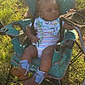 Khaleel joined the competition — help win amazing prizes! baby, bib, camping_chair, chair, child, cowboy_boots, eyes, face, grass, infant, nature, outdoor, pacifier, park, portrait, sitting, striped_clothing, summer, sunlight, toy