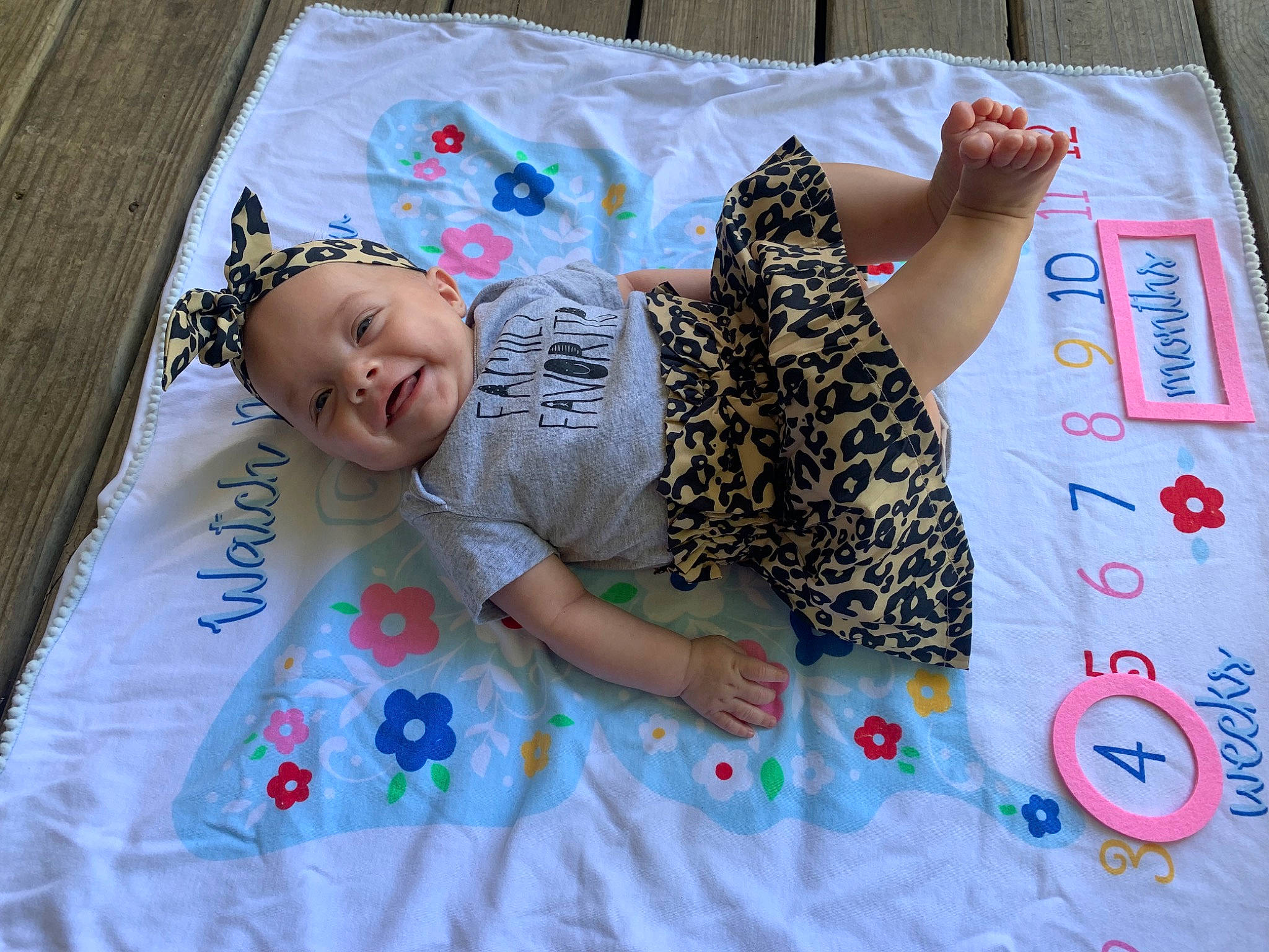 Laeklyn is registered to the contest to win money with this photo: baby, baby_toddler_clothing, bedding, bedtime, child, comfort, design, fun, happy, linens, mammal, pattern, people, person, pink, room, sleeve, smile, t_shirt, textile