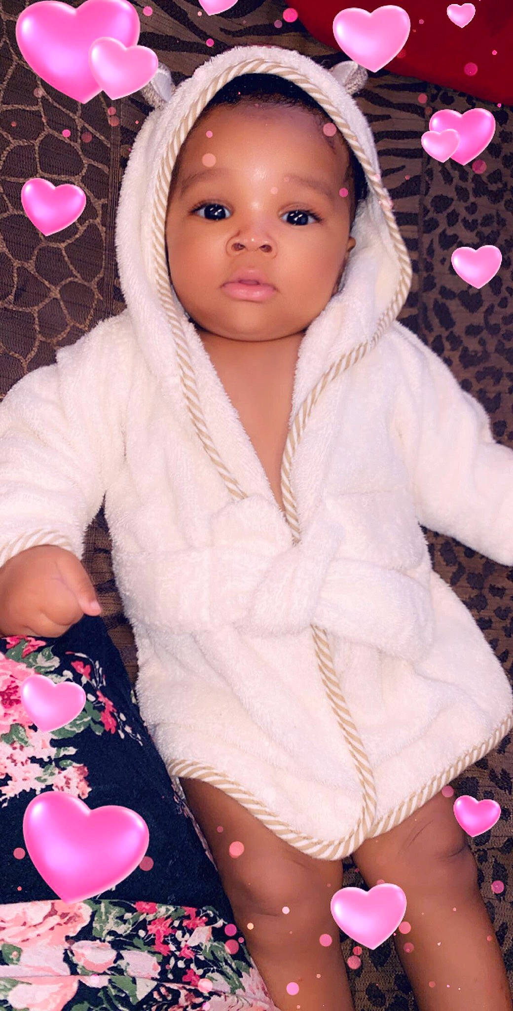 Jr is registered to the contest to win money with this photo: baby, baby_toddler_clothing, cap, cheek, clothing, comfort, face, happy, jacket, lip, magenta, organ, pattern, person, pink, skin, sleeve, textile, thigh, toddler