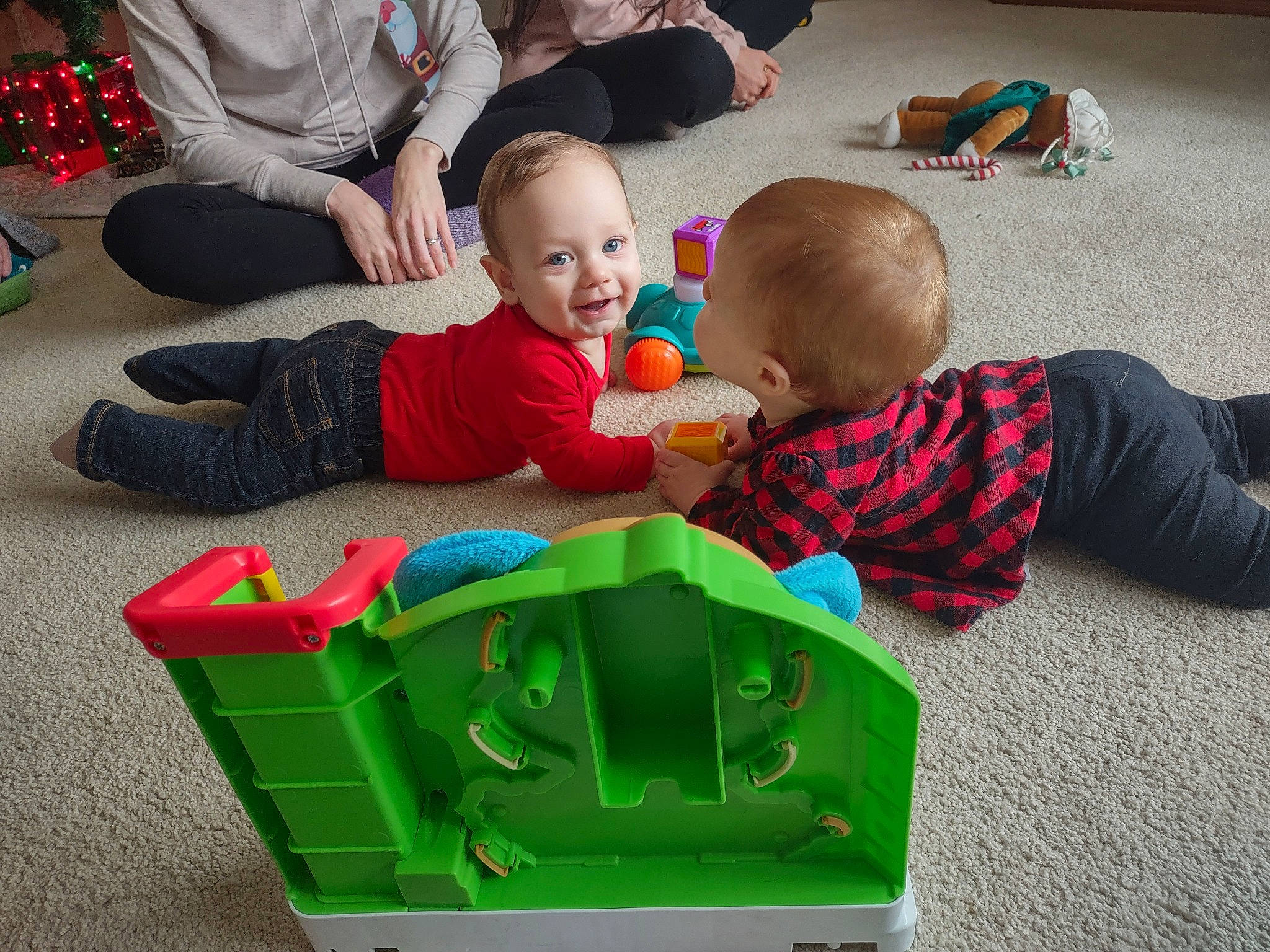Memphis is registered to the contest to win money with this photo: baby, baby_playing_with_toys, baby_toddler_clothing, child, comfort, event, flooring, fun, happy, holiday, joy, lap, leisure, person, play, room, sharing, sitting, smile, toddler