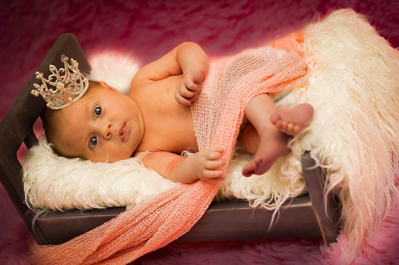 Callie is registered to the contest to win money with this photo: baby, baby_toddler_clothing, cap, child, comfort, event, fawn, finger, flash_photography, hair_accessory, hand, happy, hat, headband, headgear, headpiece, jewellery, person, pink, skin