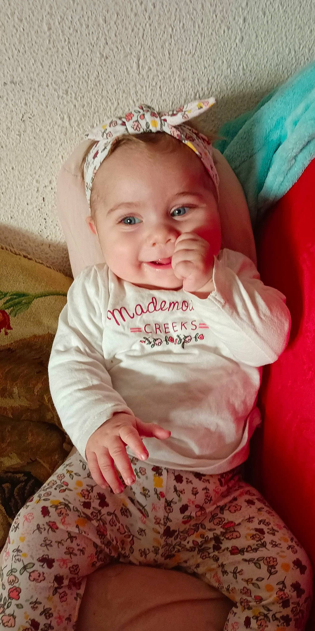 Mélody participe au concours pour gagner de l'argent avec cette photo : baby, baby_toddler_clothing, child, dress, fashion_accessory, grass, happy, head, headband, headpiece, iris, joy, lip, pattern, person, pink, skin, sleeve, smile, t_shirt