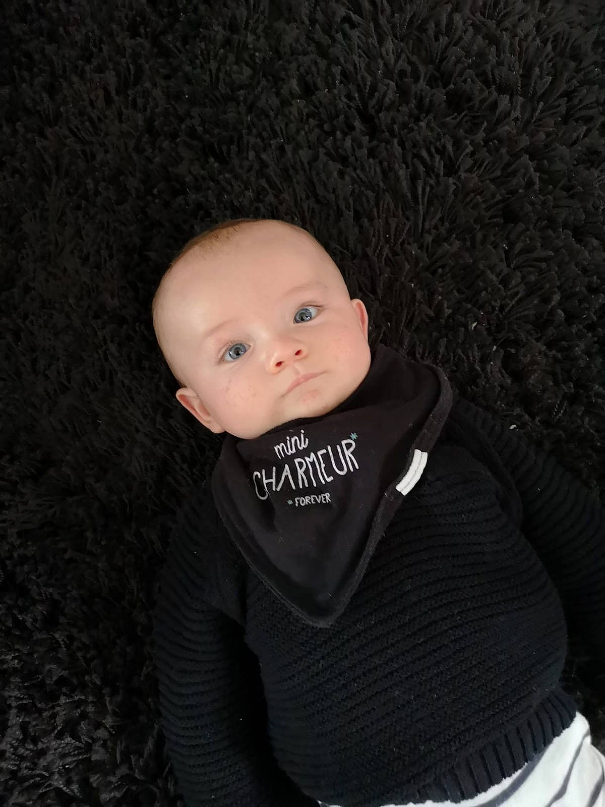 Léo participe au concours pour gagner de l'argent avec cette photo : baby, black, cheek, child, child_model, person, photography, portrait_photography, toddler