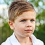 child, boy, portrait, blue_eyes, white_shirt, short_hair, outdoor, nature, young, cute, face, head, person, casual_clothing, daylight, expression, skin, human, looking_away, background_blur