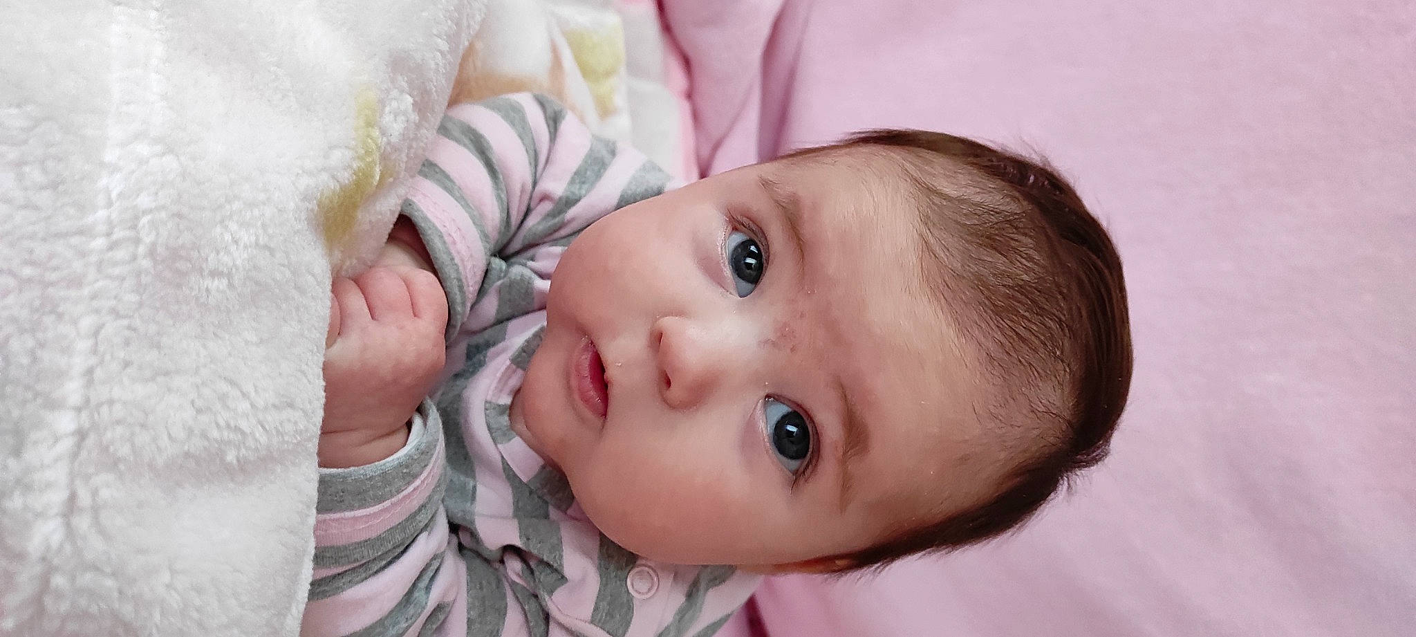 Noélie participe au concours pour gagner de l'argent avec cette photo : baby, baby_toddler_clothing, cheek, child, comfort, ear, eyebrow, eyelash, gesture, hair, happy, iris, lip, neck, nose, person, product, skin, sleeve, toddler