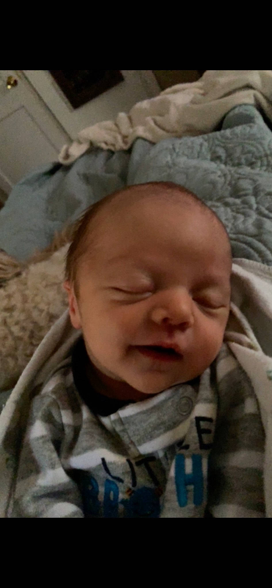 Maddux is registered to the contest to win money with this photo: cheek, child, eye, face, forehead, head, infant, military, mouth, nose, person, product, sleep, soldier, toddler