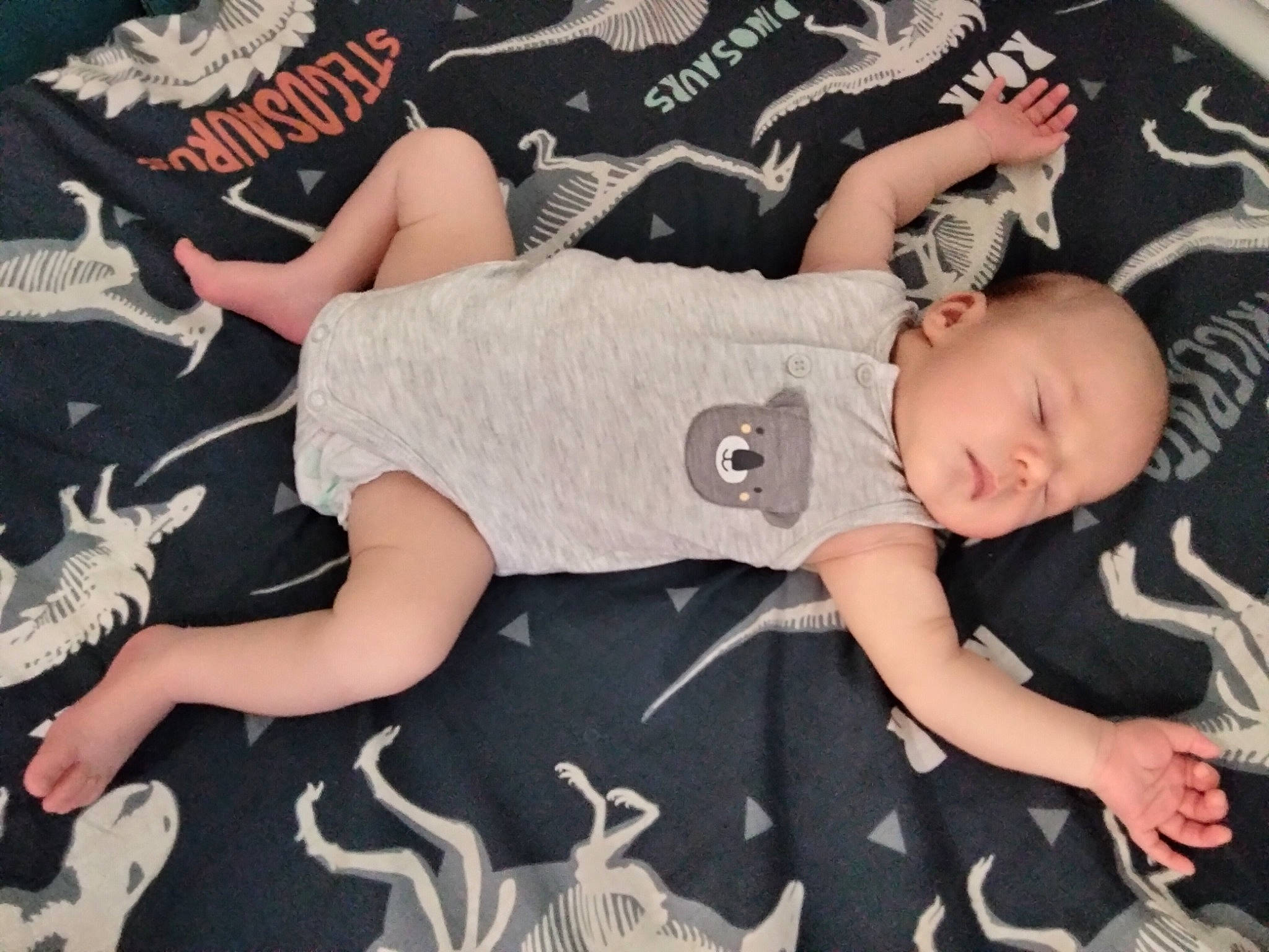 Oliver is registered to the contest to win money with this photo: baby, baby_products, baby_toddler_clothing, carmine, child, comfort, cool, font, fun, happy, hat, human_leg, lap, pattern, person, sleeve, t_shirt, textile, thigh, toddler
