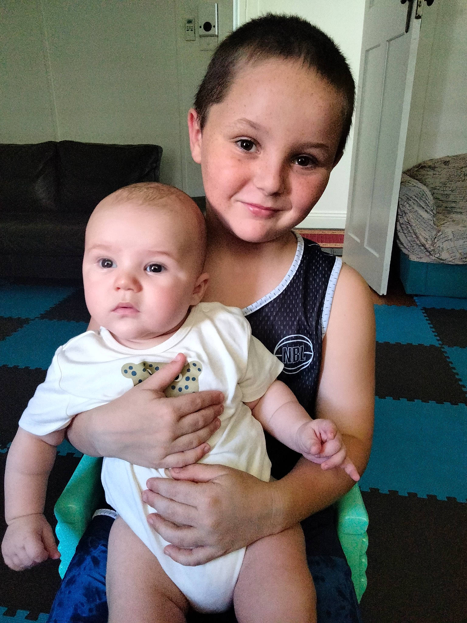 Thomas is registered to the contest to win money with this photo: baby_toddler_clothing, cheek, eye, face, flash_photography, fun, hair, hand, happy, head, human_body, iris, joy, muscle, person, shoulder, skin, smile, standing, thigh