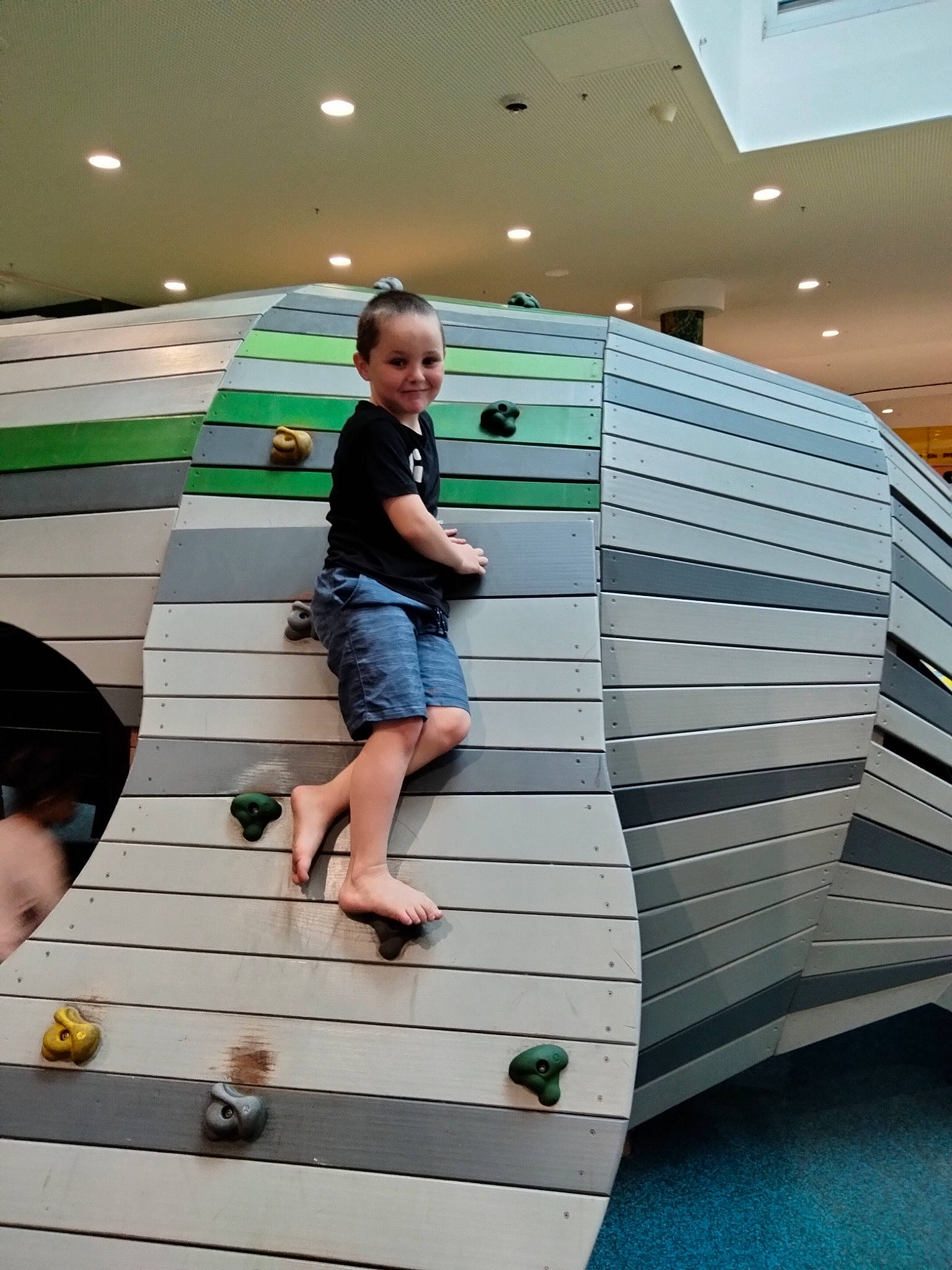 Thomas joined the competition — help win amazing prizes! ceiling, child, comfort, design, floor, flooring, fun, hardwood, human_leg, joy, leisure, pattern, person, play, recreation, room, shorts, standing, t_shirt, thigh