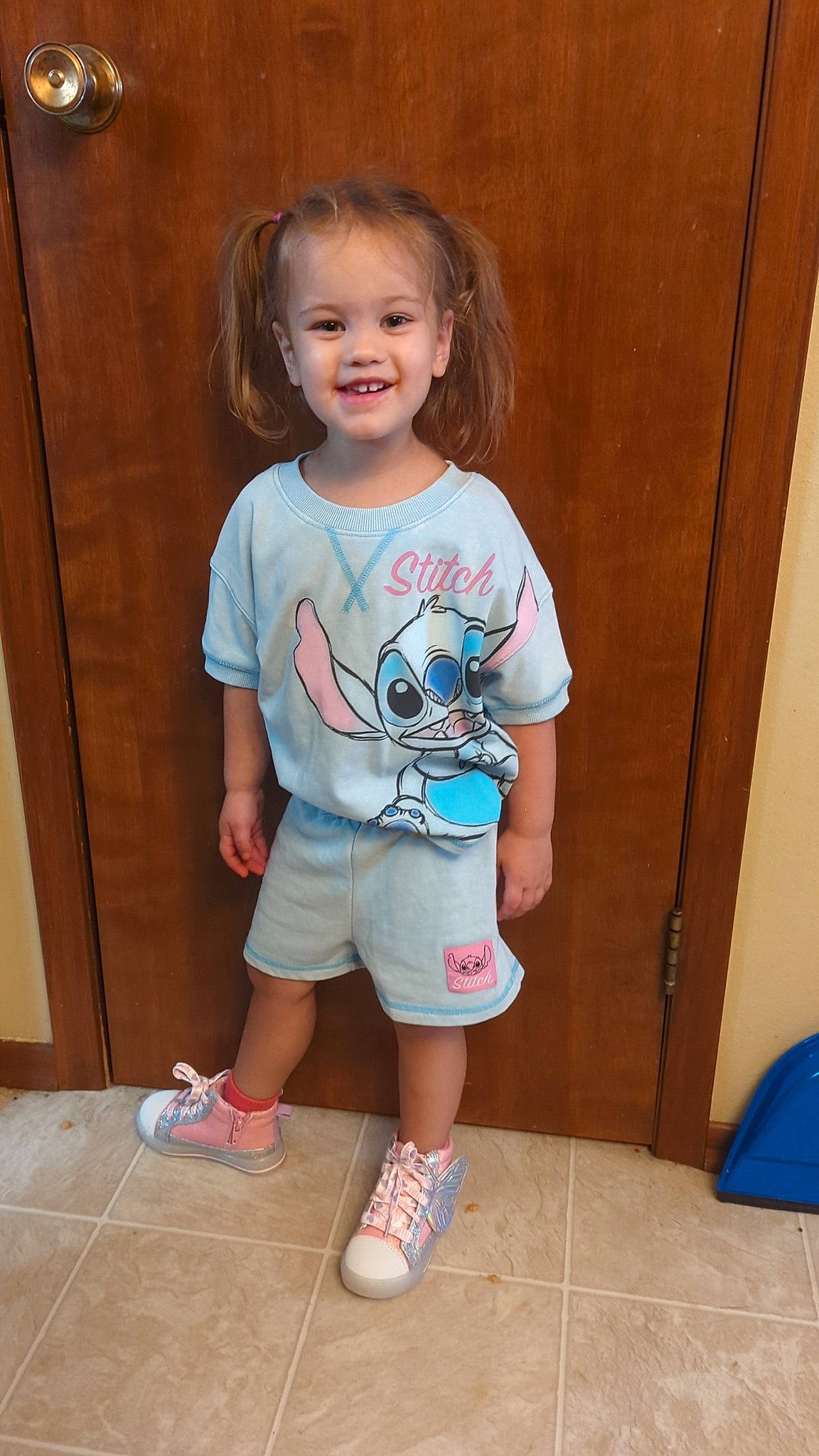 Kynlee is registered to the contest to win money with this photo: baby_toddler_clothing, blue, cheek, chin, flooring, fun, hairstyle, happy, iris, joint, joy, person, shorts, shoulder, skin, sleeve, smile, standing, t_shirt, thigh