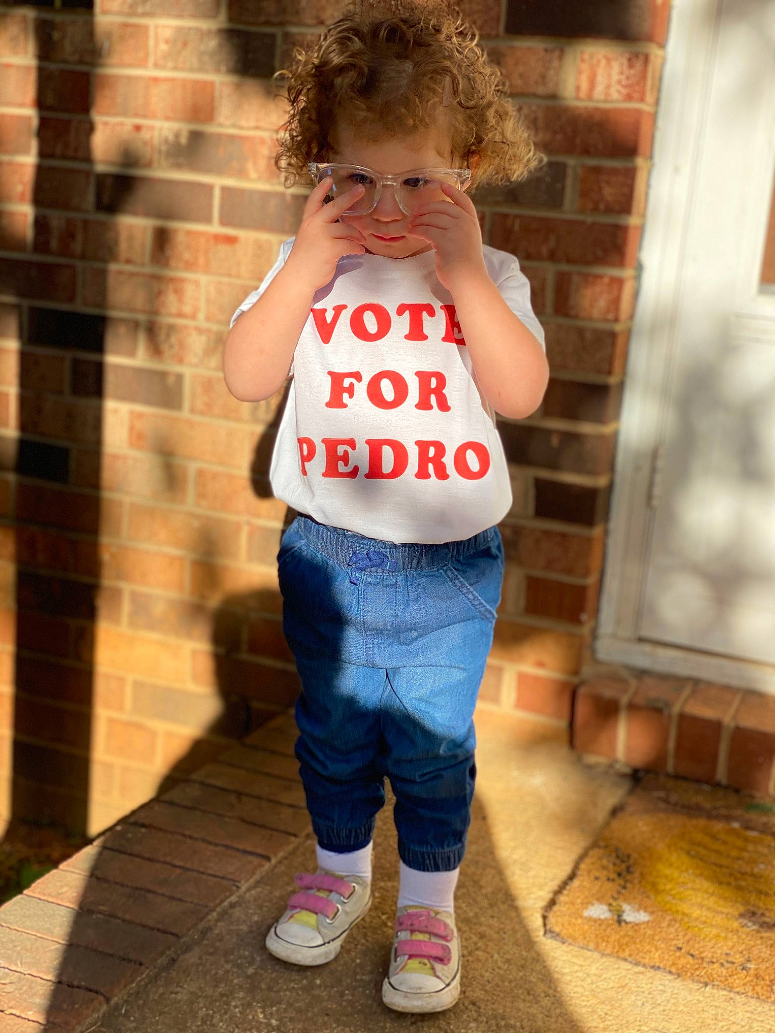 Dawsyn joined the competition — help win amazing prizes! arm, baby_toddler_clothing, clothing, denim, hair, happy, human_leg, jeans, knee, leg, neck, orange, person, shoe, skin, sleeve, sneakers, t_shirt, thigh, toddler