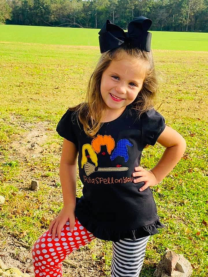 Ellie is registered to the contest to win money with this photo: fun, grass, grassland, green, hair, happy, joy, knee, leaf, light, mammal, people_in_nature, person, plant, sleeve, smile, summer, t_shirt, thigh, tree