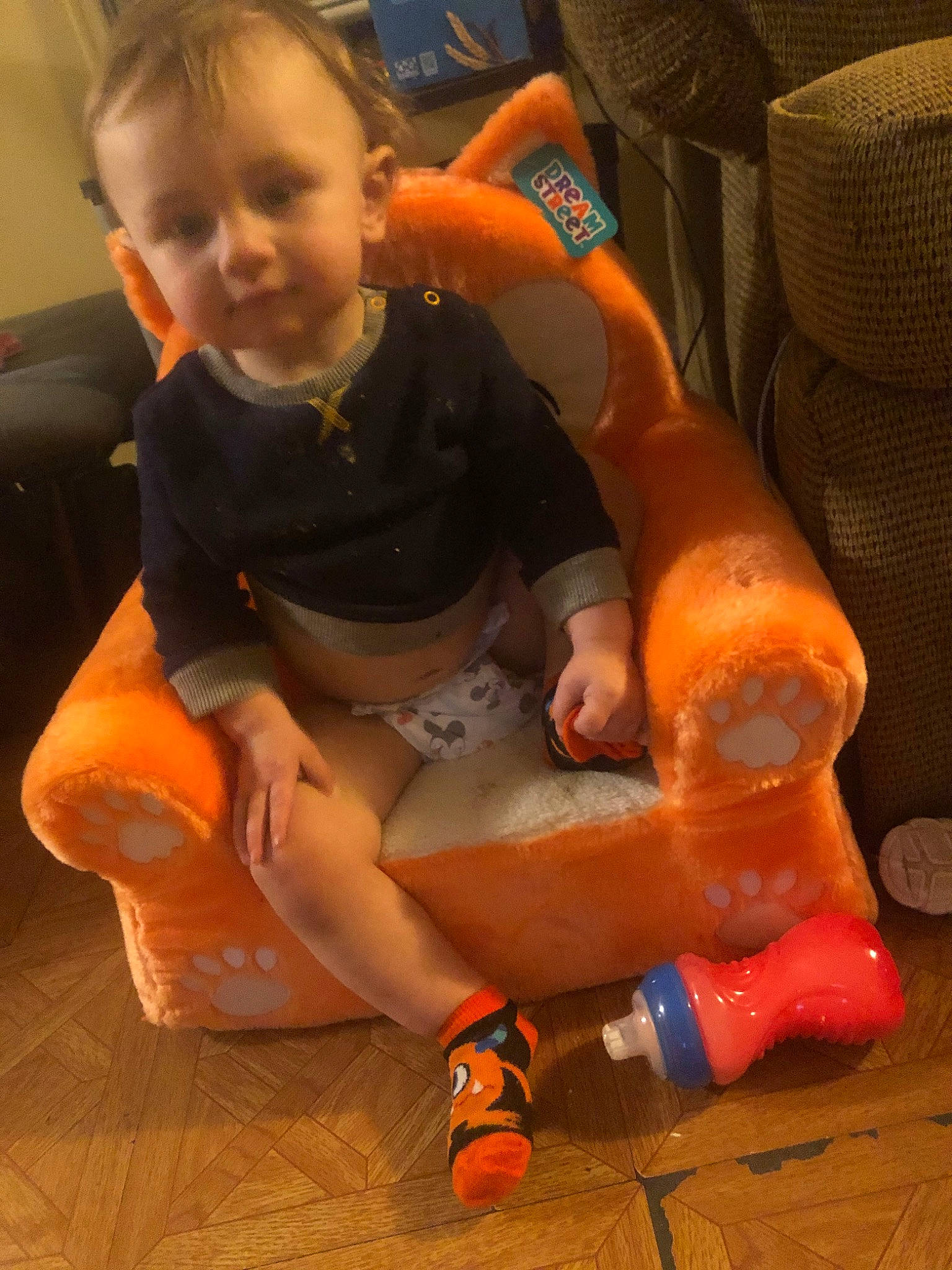 Fletcher is registered to the contest to win money with this photo: child, fun, leg, orange, person, toddler
