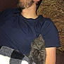 Meleys is registered to the contest to win money with this photo: man, sleeping, kitten, cat, blanket, couch, resting, cozy, indoor, relaxation, beard, closed_eyes, casual_clothing, patterned_pillow, furry, comfort, nap, human, animal, friendship