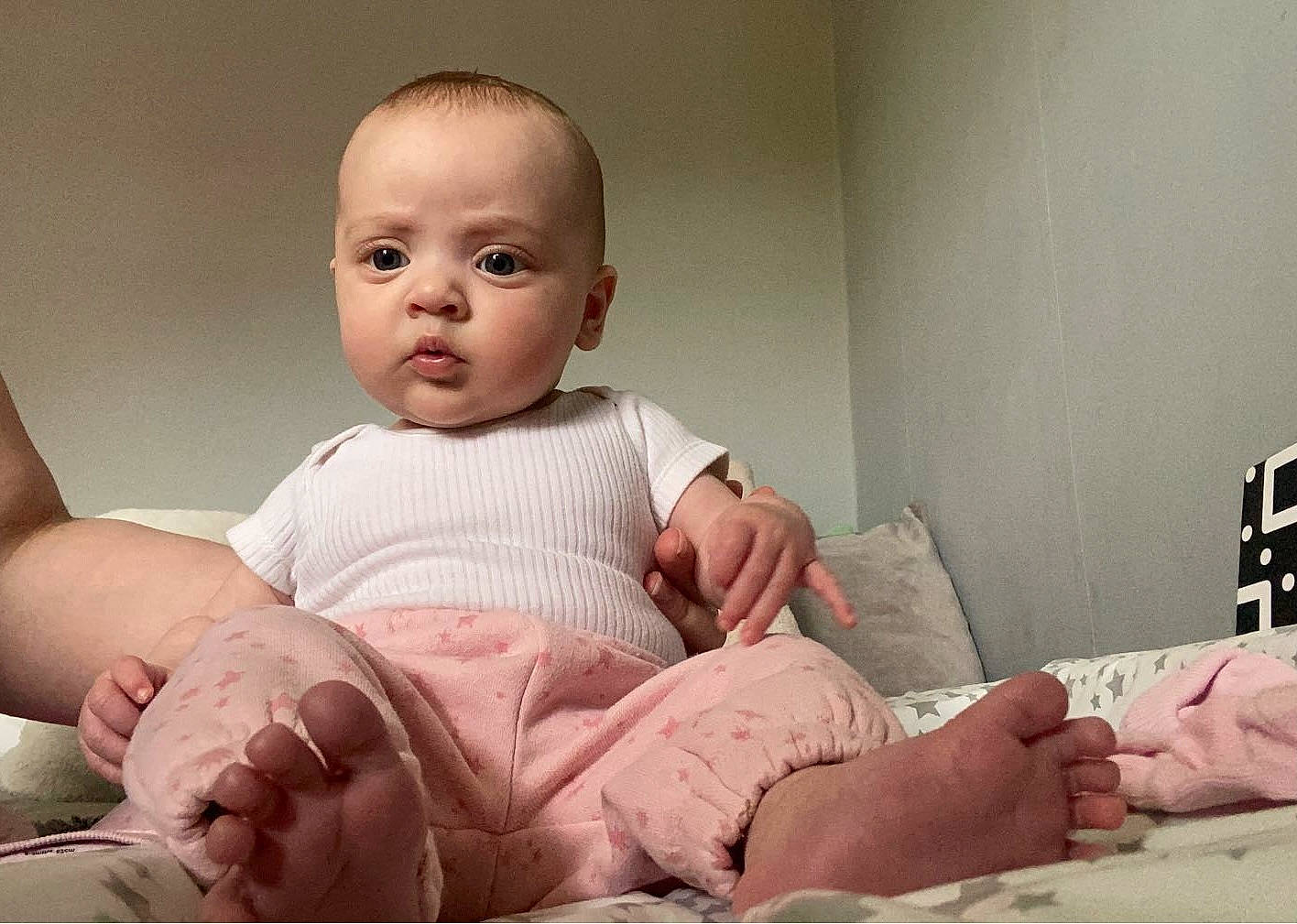 Iylah joined the competition — help win amazing prizes! baby, baby_toddler_clothing, cheek, child, comfort, foot, head, human, human_body, human_leg, joint, knee, leg, mouth, person, pink, shoulder, sitting, skin, sleeve