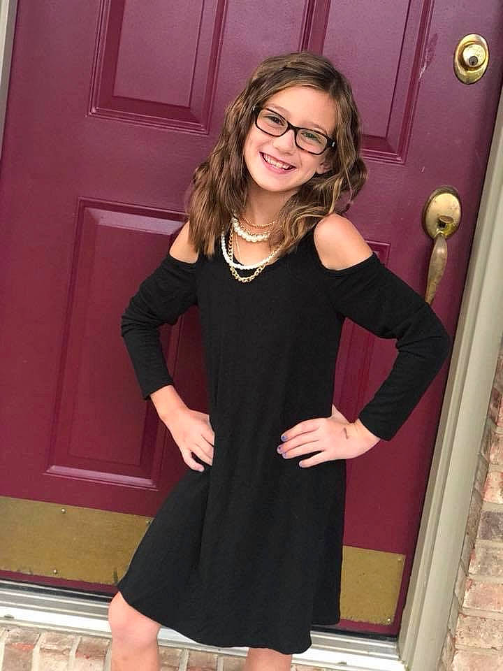 Alexis is registered to the contest to win money with this photo: black, blond, brown_hair, clothing, cocktail_dress, dress, fashion, footwear, glasses, joint, joy, leg, little_black_dress, long_hair, magenta, neck, person, shoulder, sleeve, smile