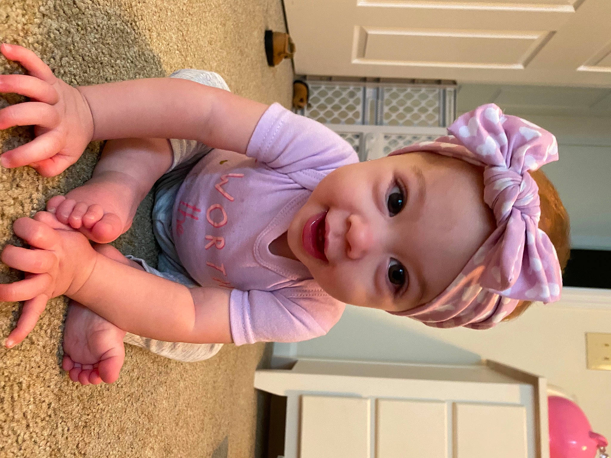 Adilynn joined the competition — help win amazing prizes! baby, baby_toddler_clothing, child, facial_expression, foot, fun, hairstyle, happy, hat, headwear, human_leg, mammal, nail, nose, person, pink, skin, smile, thigh, thumb