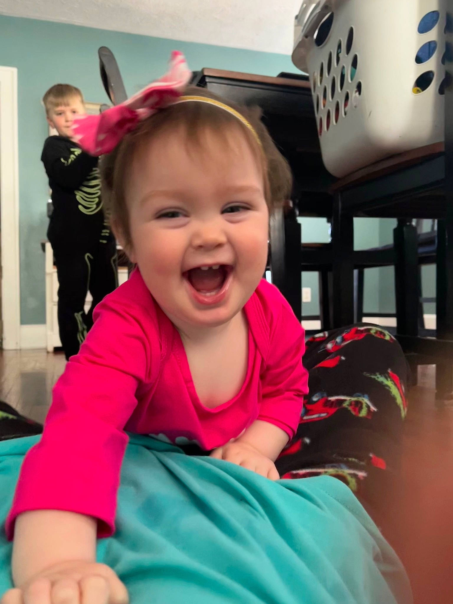 Hazel Neyer is registered to the contest to win money with this photo: baby, baby_toddler_clothing, beauty, child, event, fun, gesture, happy, head, joy, leisure, magenta, mouth, person, pink, product, recreation, skin, sleeve, smile