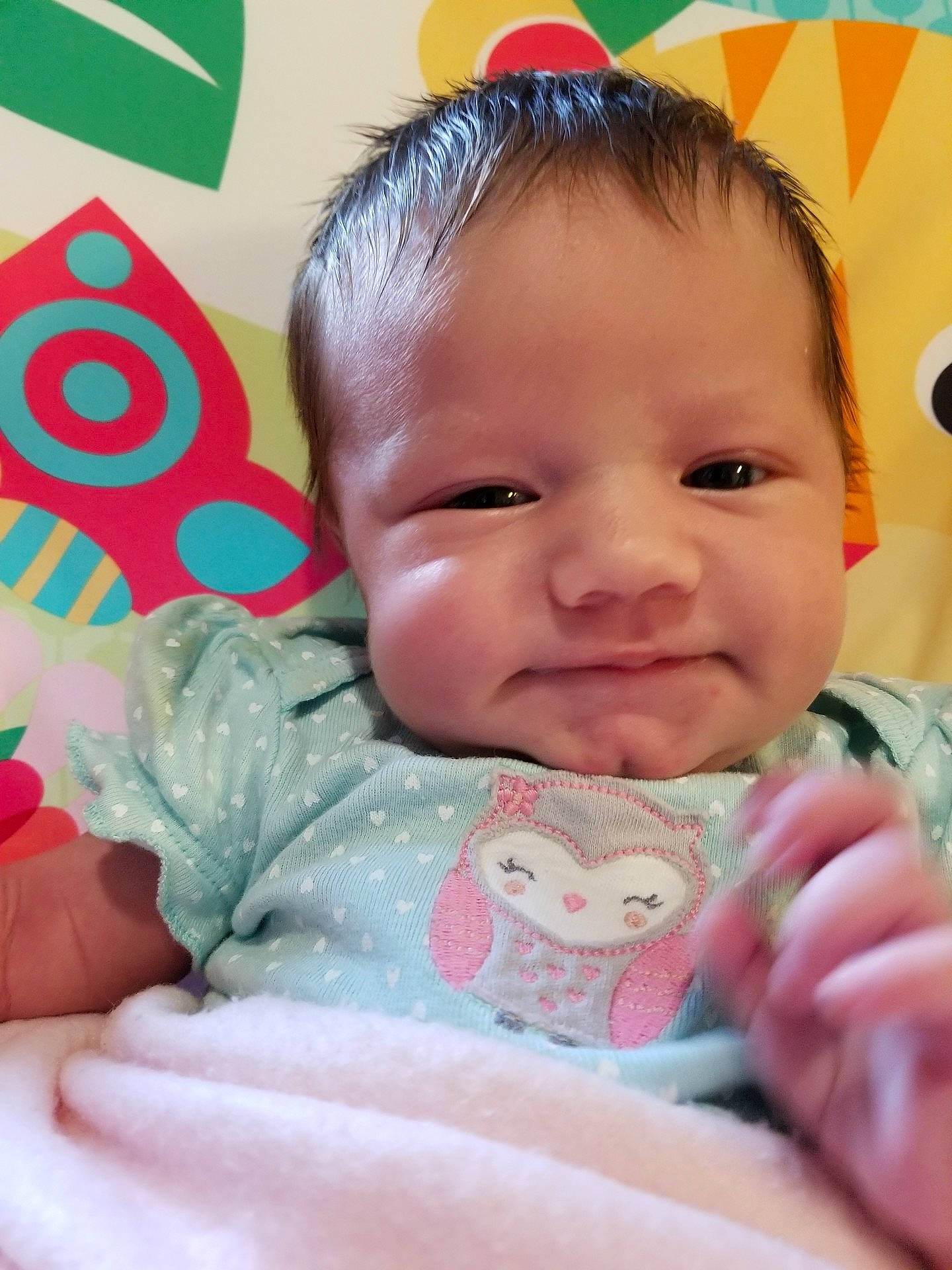 Anniston is registered to the contest to win money with this photo: cheek, child, day, eye, finger, infant, iris, lip, mouth, nose, person, pink, play, product, skin, smile, sweetness, toddler