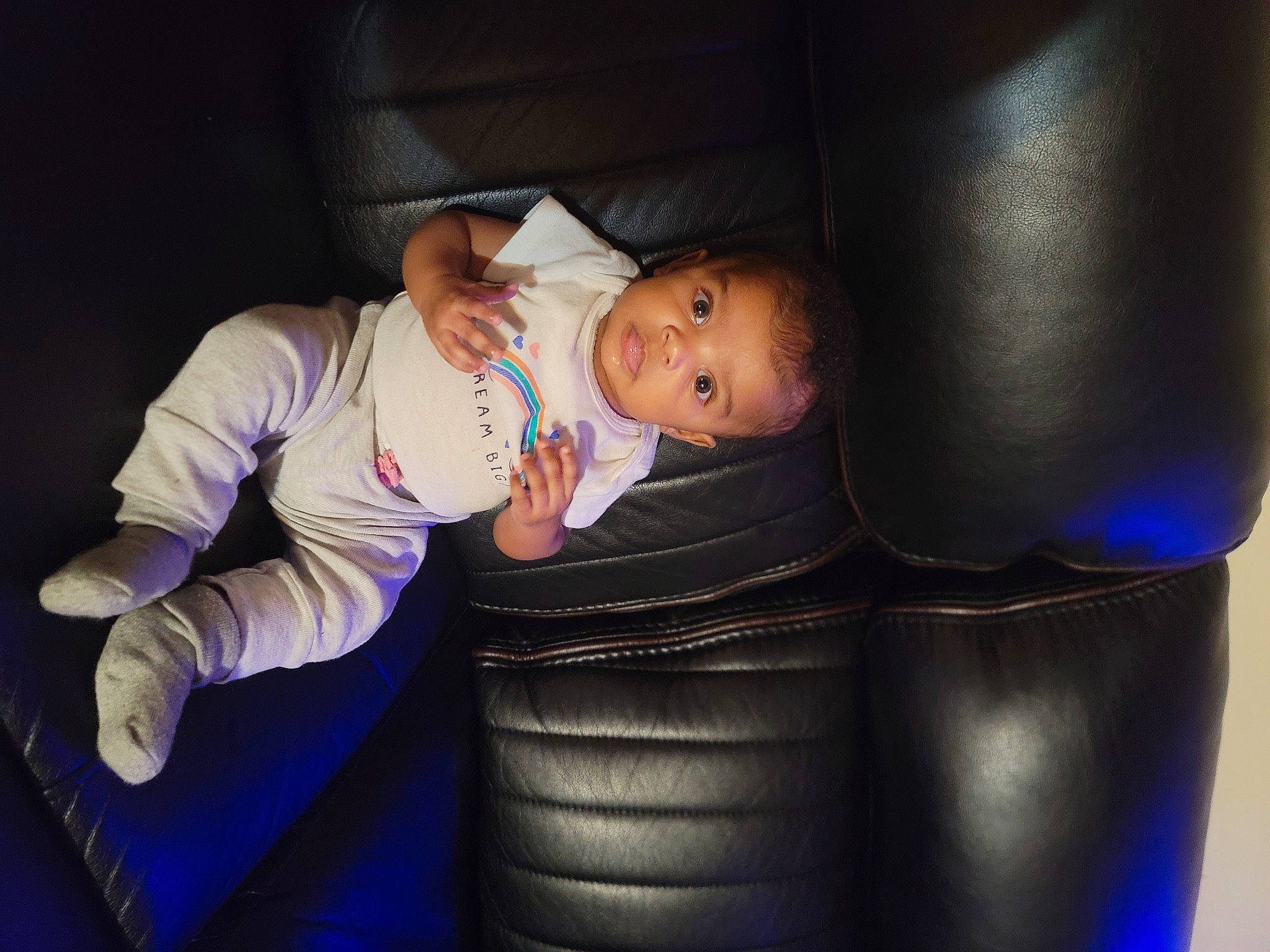 Aniyah is registered to the contest to win money with this photo: baby, baby_products, baby_toddler_clothing, car_seat, child, comfort, cylinder, electric_blue, flash_photography, fun, gas, hat, person, purple, sitting, thigh, thumb, toddler