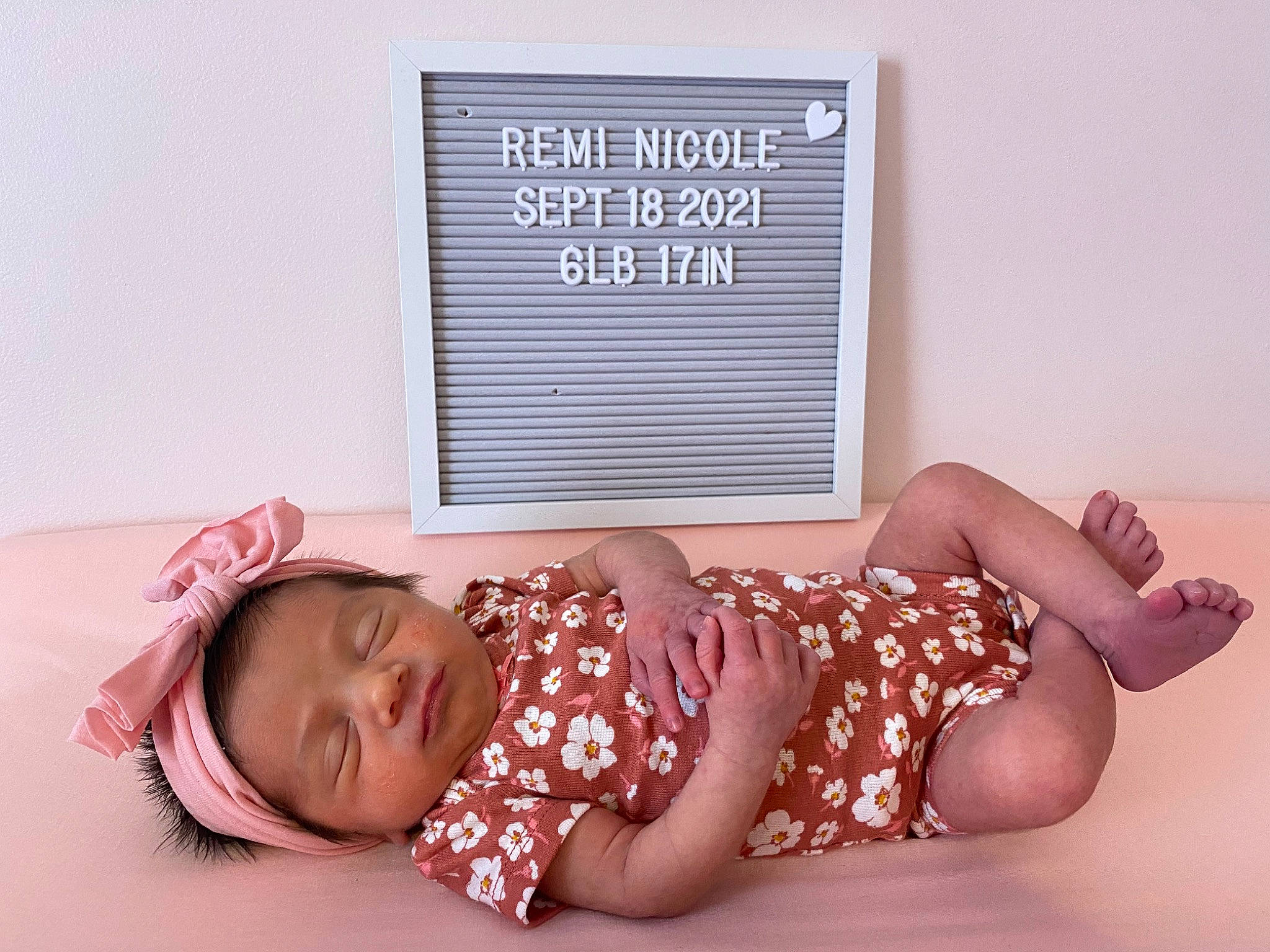 Remi joined the competition — help win amazing prizes! arm, baby_toddler_clothing, comfort, couch, facial_expression, finger, font, happy, headgear, human_body, human_leg, knee, leg, linens, muscle, pattern, person, pink, product, textile