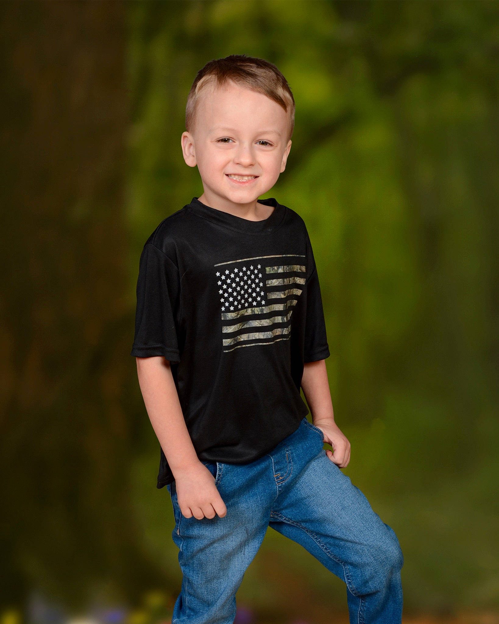 Lane is registered to the contest to win money with this photo: denim, electric_blue, face, flash_photography, fun, grass, happy, jeans, joy, leisure, person, portrait, portrait_photography, sitting, sleeve, smile, standing, t_shirt, toddler, top