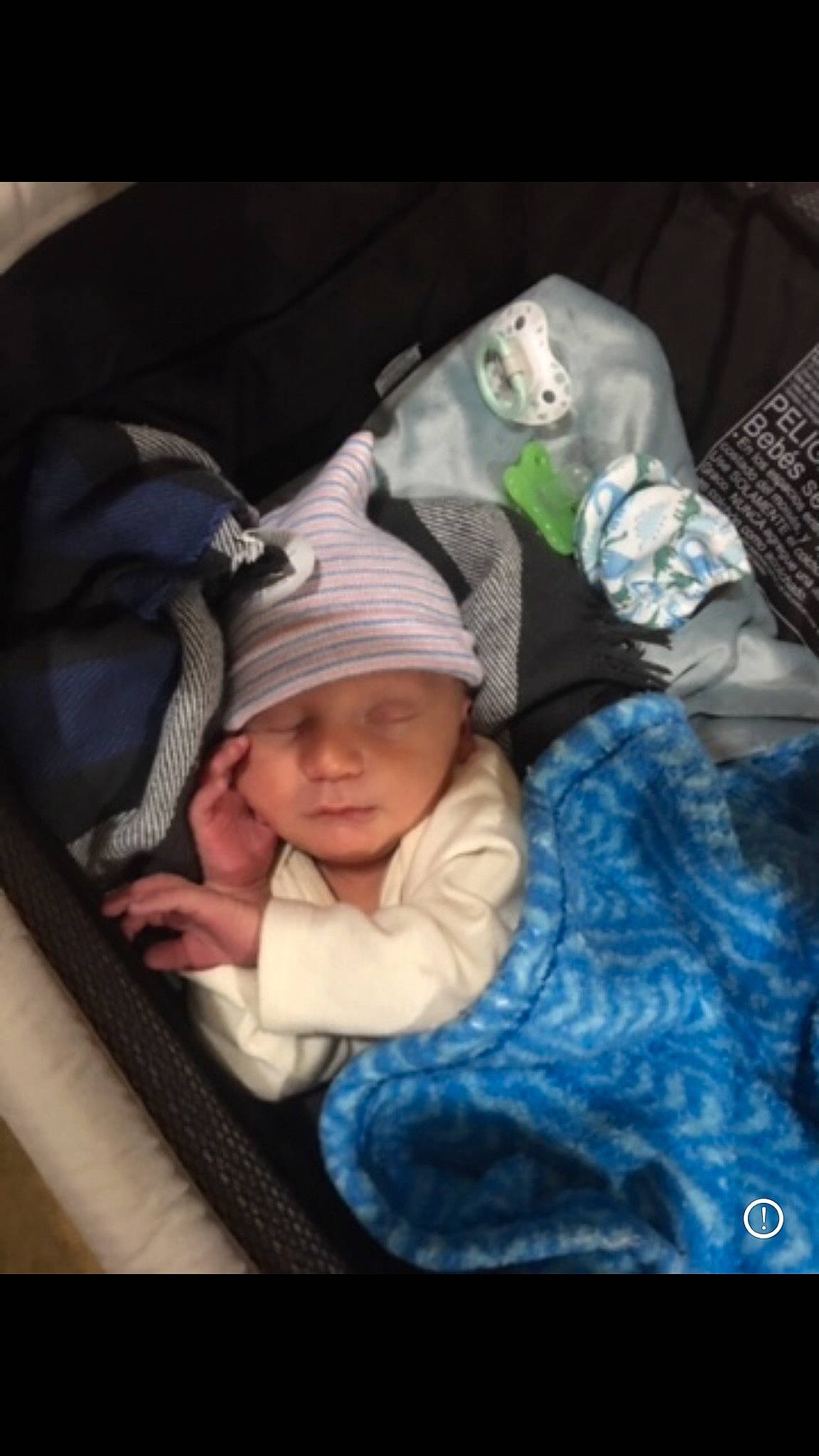 Keith is registered to the contest to win money with this photo: baby, baby_in_car_seat, baby_products, baby_sleeping, baby_toddler_clothing, bedtime, cheek, child, comfort, headwear, linens, nap, person, room, sitting, sleep, sleeve, toddler