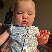 Alexis joined the competition — help win amazing prizes! arm, baby, blue_dress, buttoned_dress, candid, child, closeup, curious_expression, face, floral_pattern, hand, holding, human, indoor, person, portrait, pouty_lips, short_hair, skin, sunlight