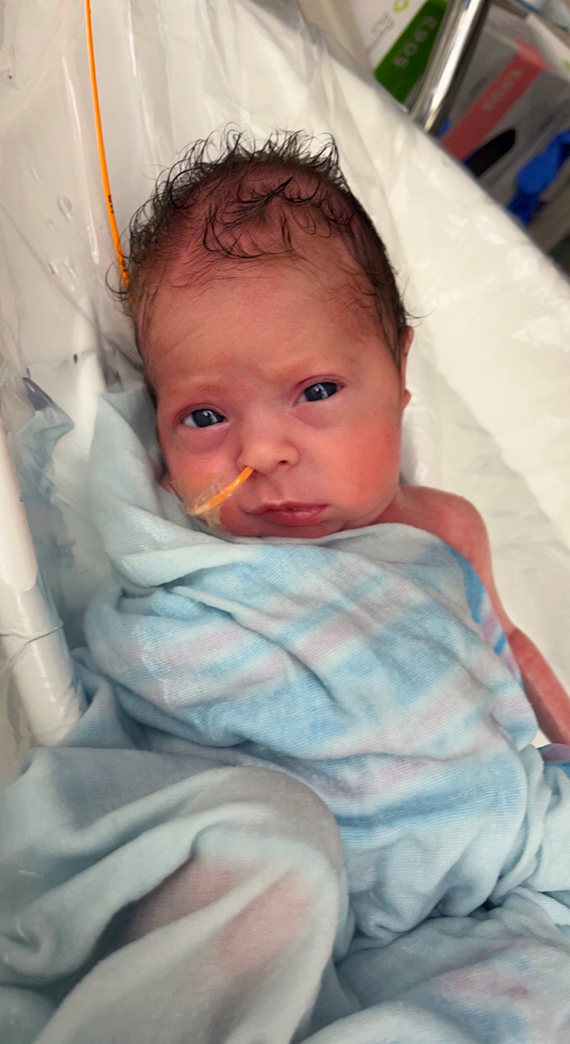 Eliyanah is registered to the contest to win money with this photo: arm, baby, cheek, chin, comfort, eye, eyebrow, eyelash, face, finger, hand, head, human_body, iris, linens, lip, mouth, nose, person, skin