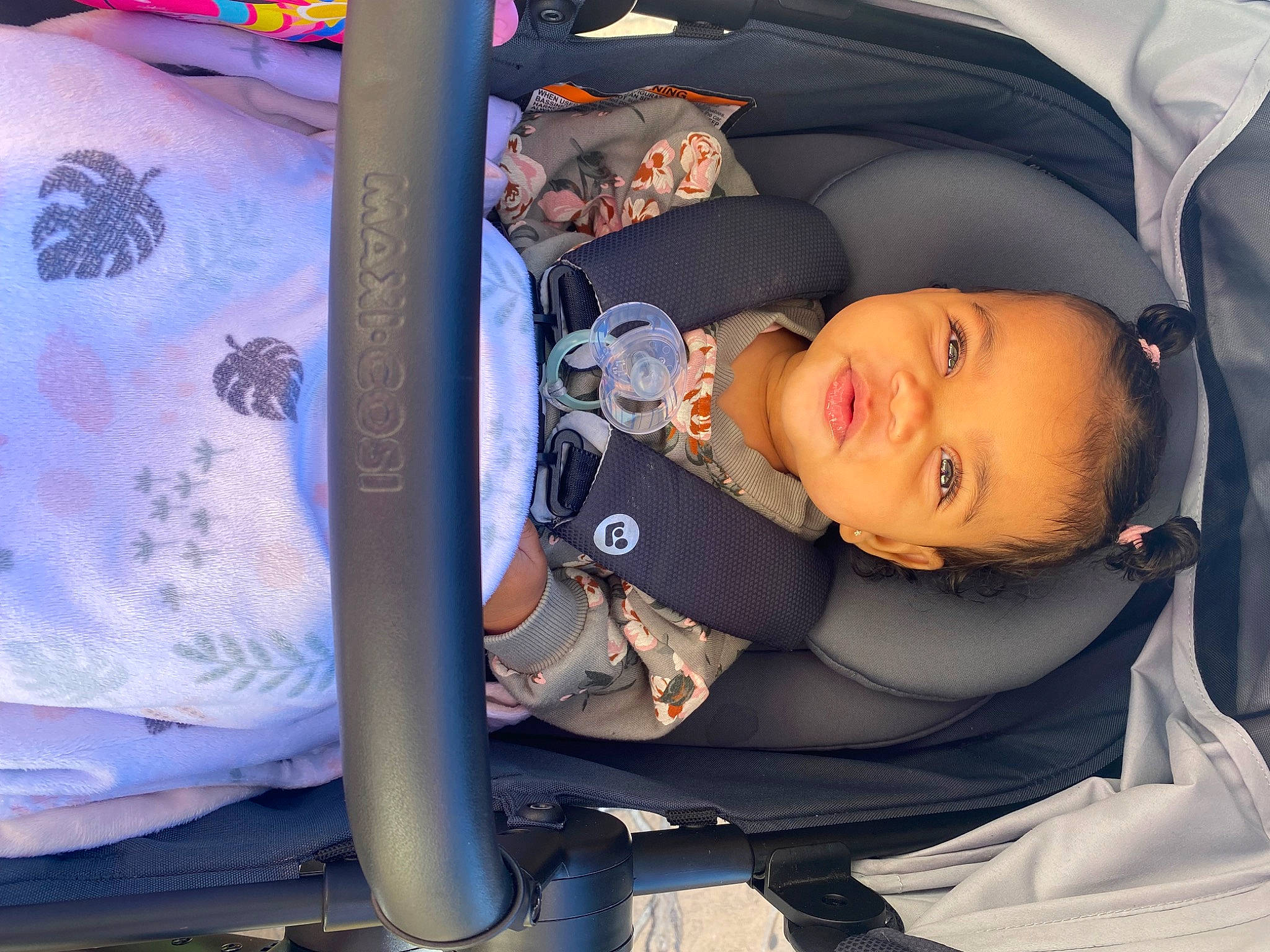 Amarah is registered to the contest to win money with this photo: auto_part, automotive_design, baby, baby_carriage, baby_products, car_seat, child, comfort, electric_blue, fun, leisure, person, sitting, smile, toddler, vacation