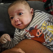 Matteo joined the competition — help win amazing prizes! arm, baby, cartoon_characters, child, closeup, comfort, curious, cute, expression, eyes, face, hand, indoor, infant, lying_down, onesie, person, skin, striped_clothing, tender_moment