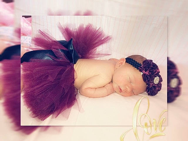 Kinsley joined the competition — help win amazing prizes! arm, art, baby, cap, eyebrow, eyelash, finger, font, happy, headband, headgear, headpiece, headwear, magenta, person, petal, pink, plant, purple, textile