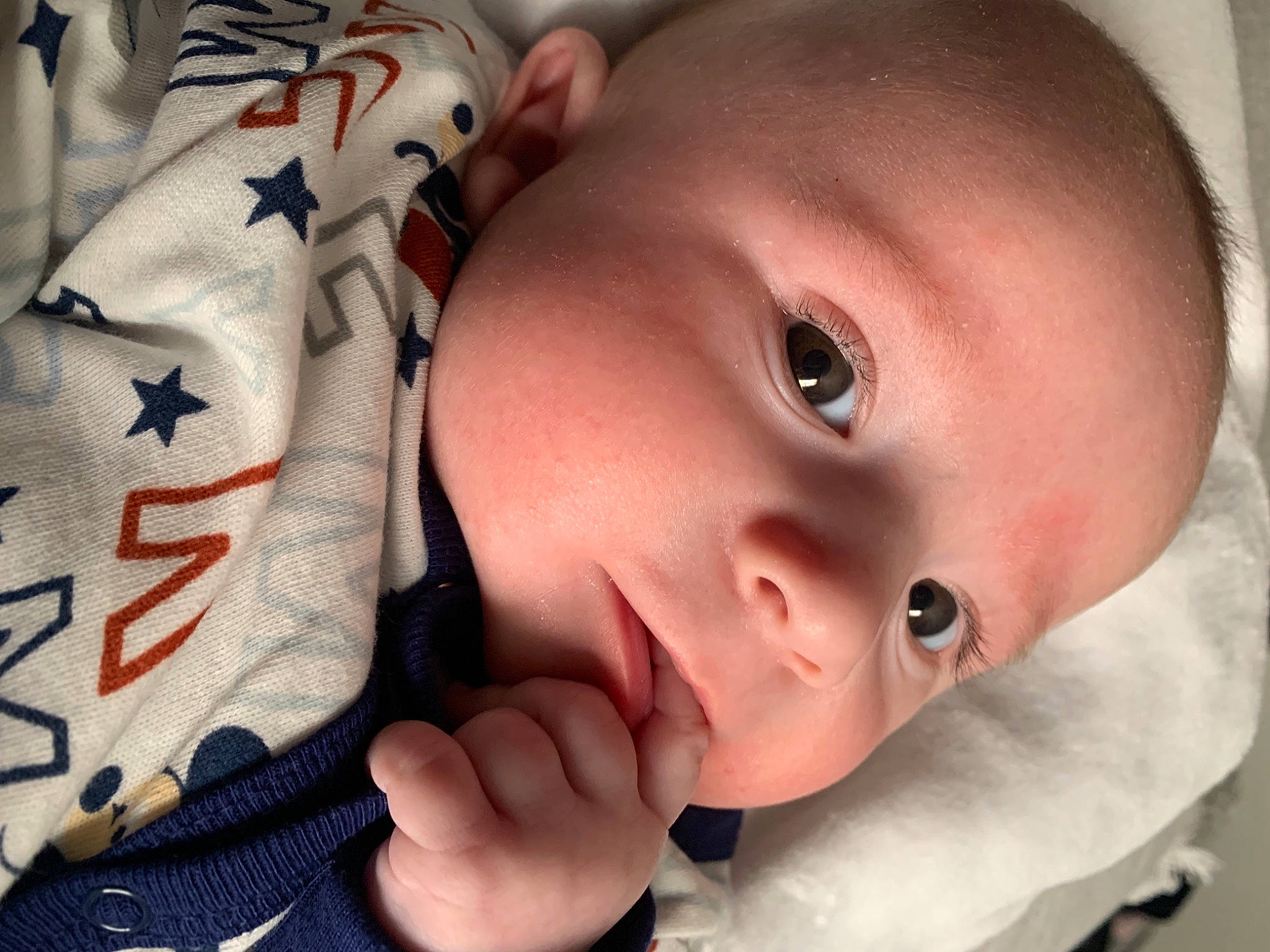 Jay is registered to the contest to win money with this photo: baby, cheek, child, close_up, comfort, ear, eye, eyebrow, eyelash, finger, forehead, gesture, happy, iris, lip, mouth, nose, person, skin, thumb