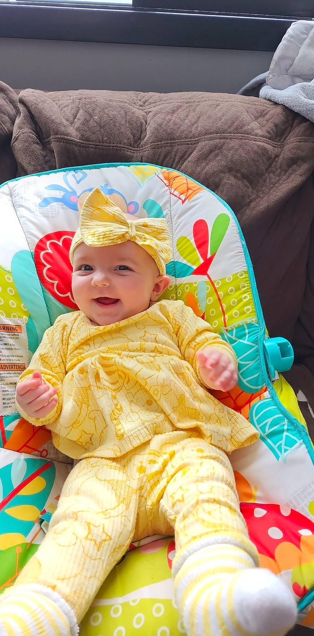 Shania joined the competition — help win amazing prizes! baby, baby_products, baby_toddler_clothing, cheek, child, comfort, face, fun, happy, headwear, linens, person, product, room, sitting, sleeve, smile, textile, toddler, vacation
