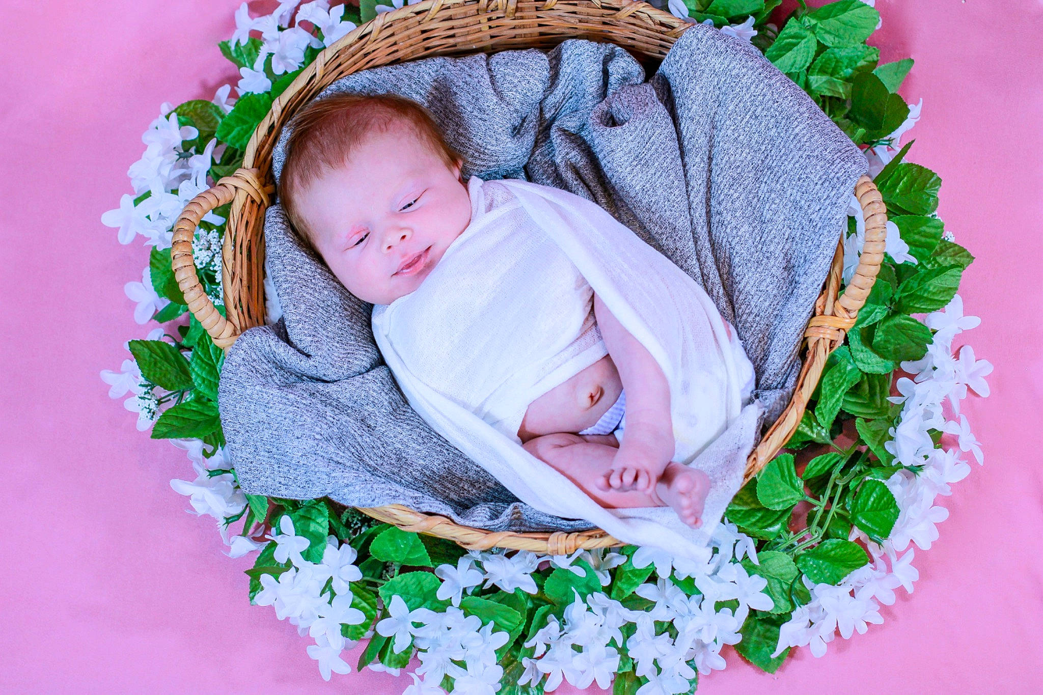 Autumn is registered to the contest to win money with this photo: baby, baby_toddler_clothing, child, comfort, cut_flowers, flower, flower_arranging, grass, green, happy, linens, person, petal, pink, plant, rose, rose_family, rose_order, spring, textile