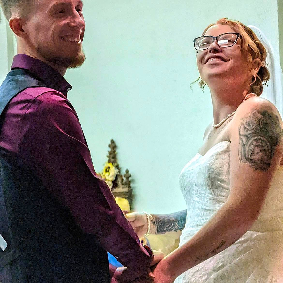 Colby is registered to the contest to win money with this photo: bridal_accessory, bridal_clothing, bride, dress, flash_photography, formal_wear, fun, gesture, gown, happy, interaction, joint, joy, organ, person, photograph, shoulder, sleeve, smile, vision_care