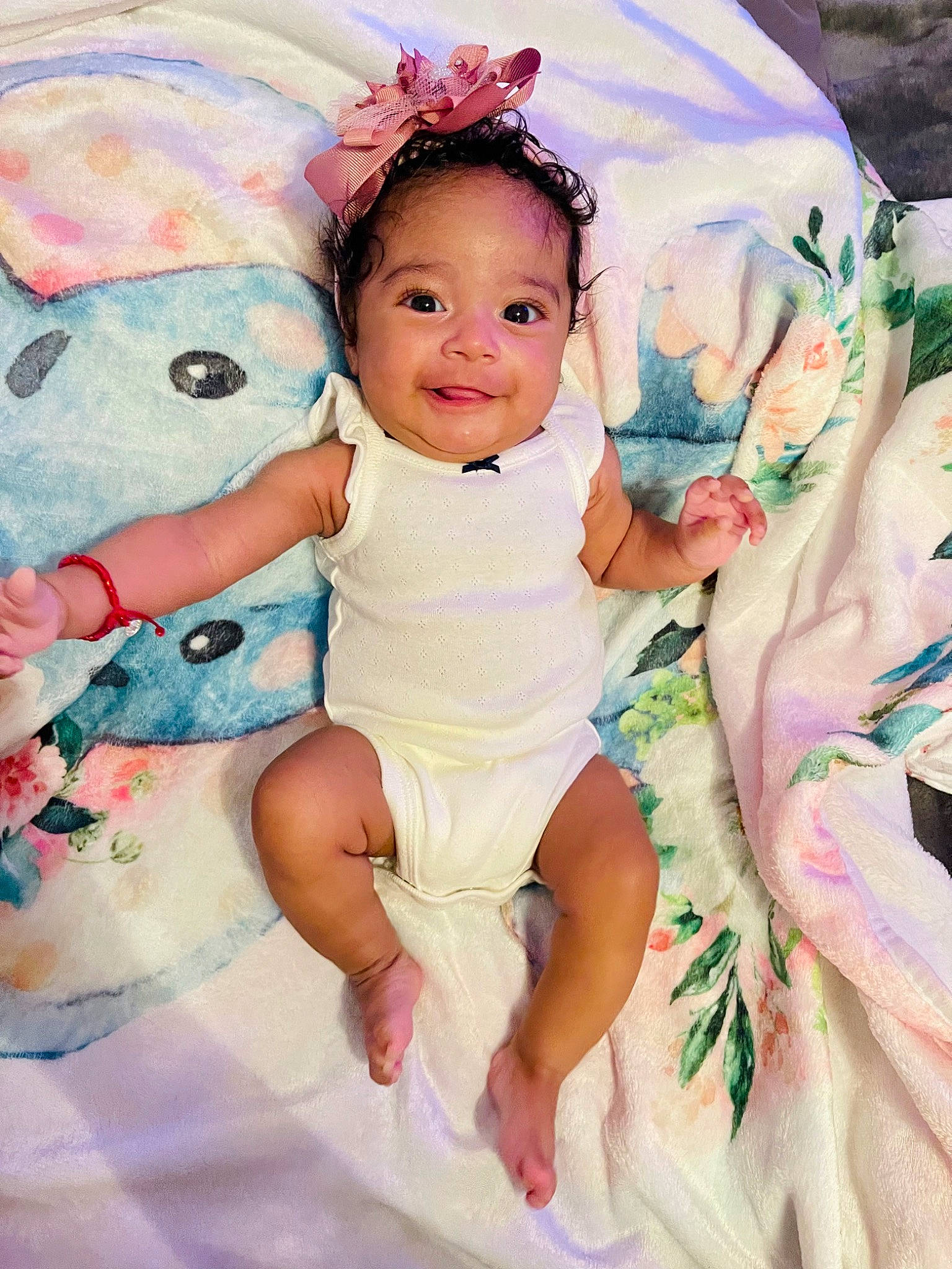 Alianna is registered to the contest to win money with this photo: baby, baby_toddler_clothing, cheek, child, dress, eye, fashion_accessory, happy, head, headband, headpiece, iris, joy, pattern, person, pink, sitting, skin, sleeve, smile