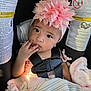 Zanaya is registered to the contest to win money with this photo: baby, blanket, car_seat, child, child_safety, child_seat, closeup, curious, cute, face, fingers, headband, indoors, infant, pink_flower, portrait, safety_belt, small_earrings, soft_texture, toddler