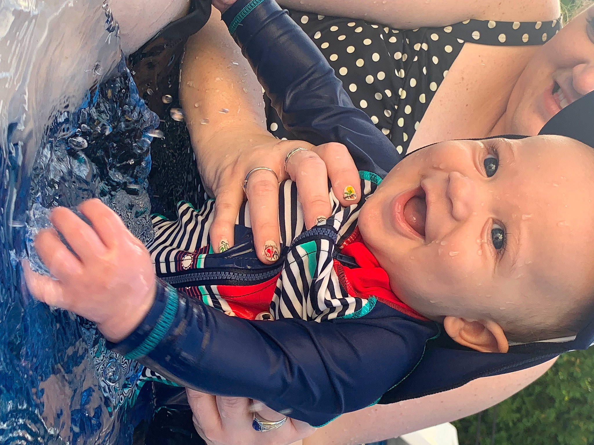 Markus is registered to the contest to win money with this photo: arm, black_hair, cool, electric_blue, eyelash, eyewear, finger, fun, gesture, hairstyle, hand, happy, leisure, lip, mouth, nail, people_in_nature, person, skin, toddler