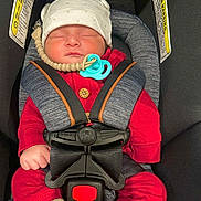 Ian Noah Osorto joined the competition — help win amazing prizes! baby, sleeping, car_seat, red_clothing, white_hat, pacifier, beaded_clip, safety_harness, infant, child, cute, cozy, seatbelt, car_interior, warning_label, hands, headwear, resting, newborn, toddler