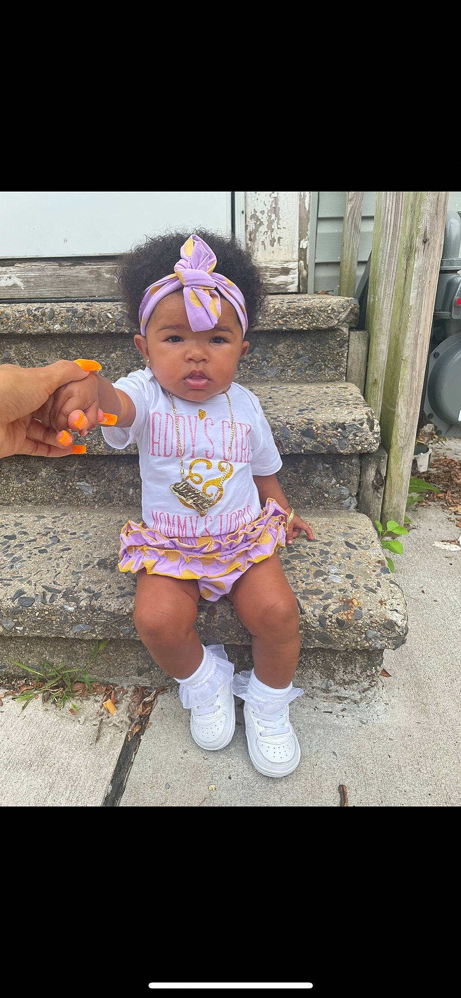 Aminah is registered to the contest to win money with this photo: baby, baby_toddler_clothing, cap, child, cool, fashion_accessory, footwear, fun, grass, happy, hat, headwear, human_leg, knee, magenta, person, sandal, sock, street_fashion, t_shirt