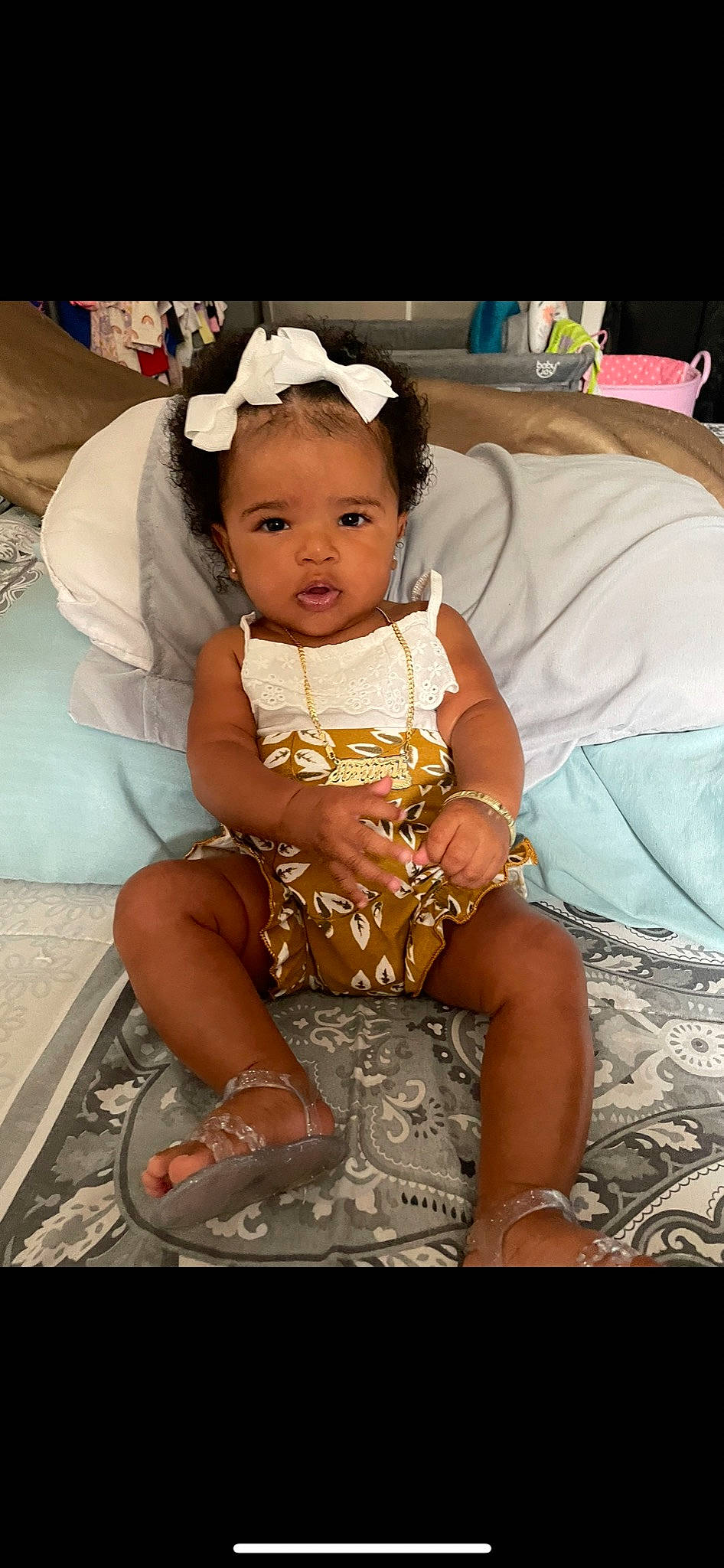 Aminah joined the competition — help win amazing prizes! baby, baby_toddler_clothing, chair, child, comfort, embellishment, event, fashion_accessory, fashion_design, happy, head, headband, headpiece, iris, jewellery, person, sitting, skin, thigh, toddler