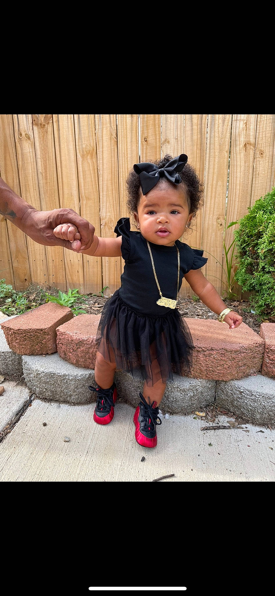 Aminah is registered to the contest to win money with this photo: baby, baby_toddler_clothing, child, day_dress, dress, fashion_accessory, fashion_design, footwear, formal_wear, happy, human_leg, jewellery, magenta, pattern, person, pink, plant, sandal, sleeve, toddler