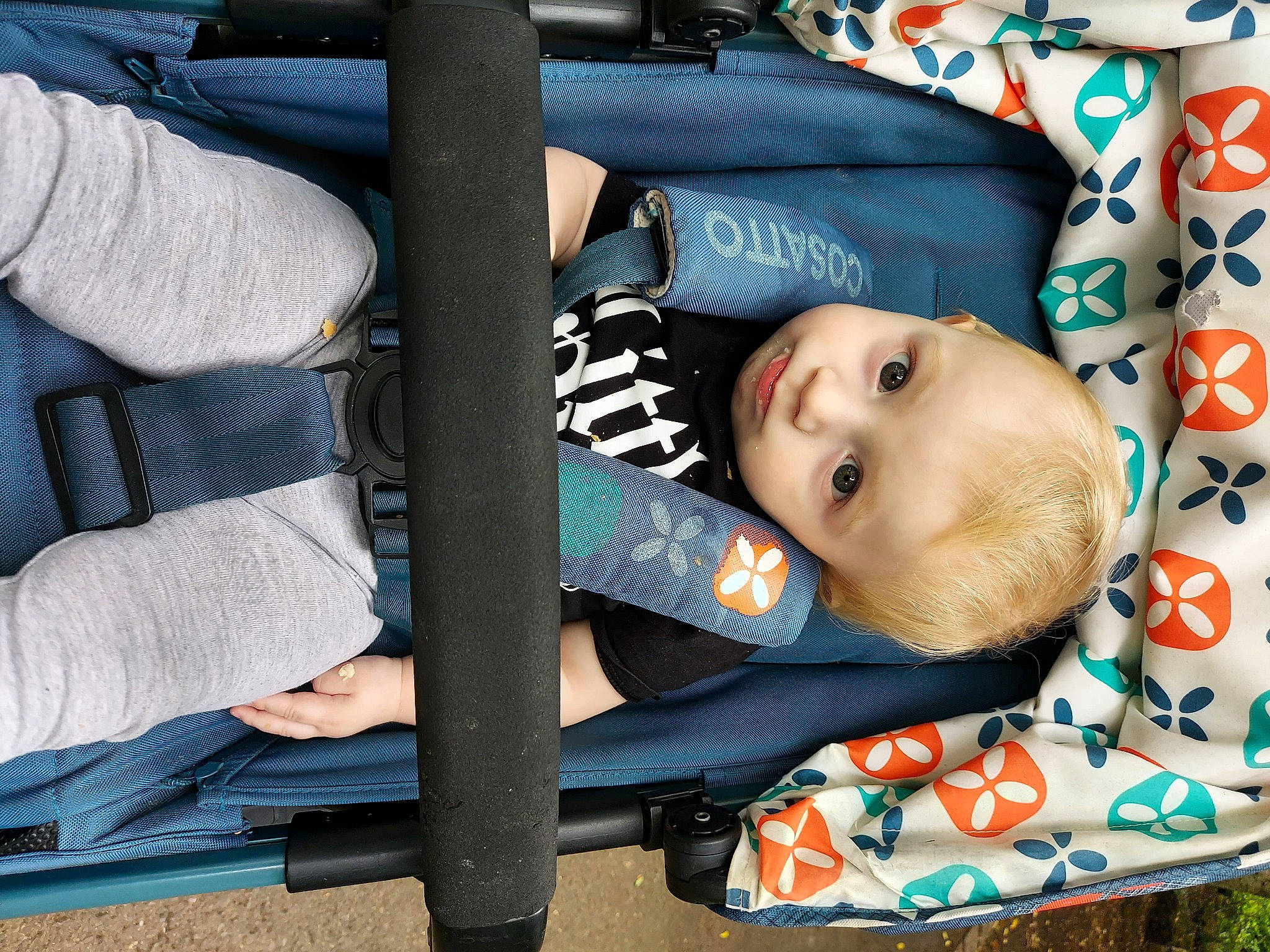 Jake joined the competition — help win amazing prizes! baby, baby_carriage, baby_products, baby_safety, baby_toddler_clothing, cheek, child, comfort, electric_blue, eye, face, facial_expression, outerwear, pattern, person, sitting, sleeve, smile, toddler, tree