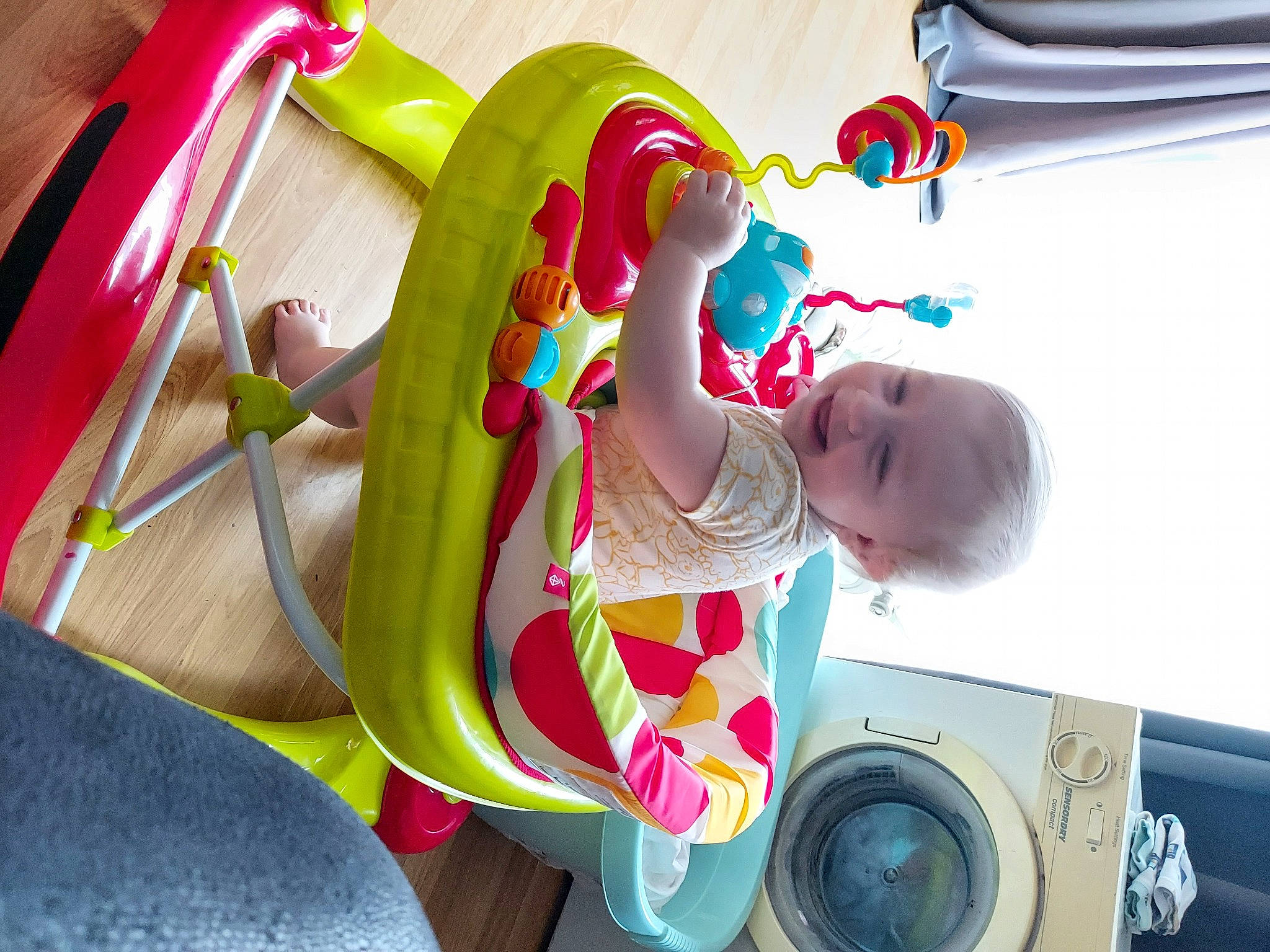 Jake is registered to the contest to win money with this photo: baby, baby_products, baby_toddler_clothing, child, clothes_dryer, comfort, eye, fun, happy, joy, laundry_room, magenta, organ, person, pink, product, purple, room, skin, snapshot