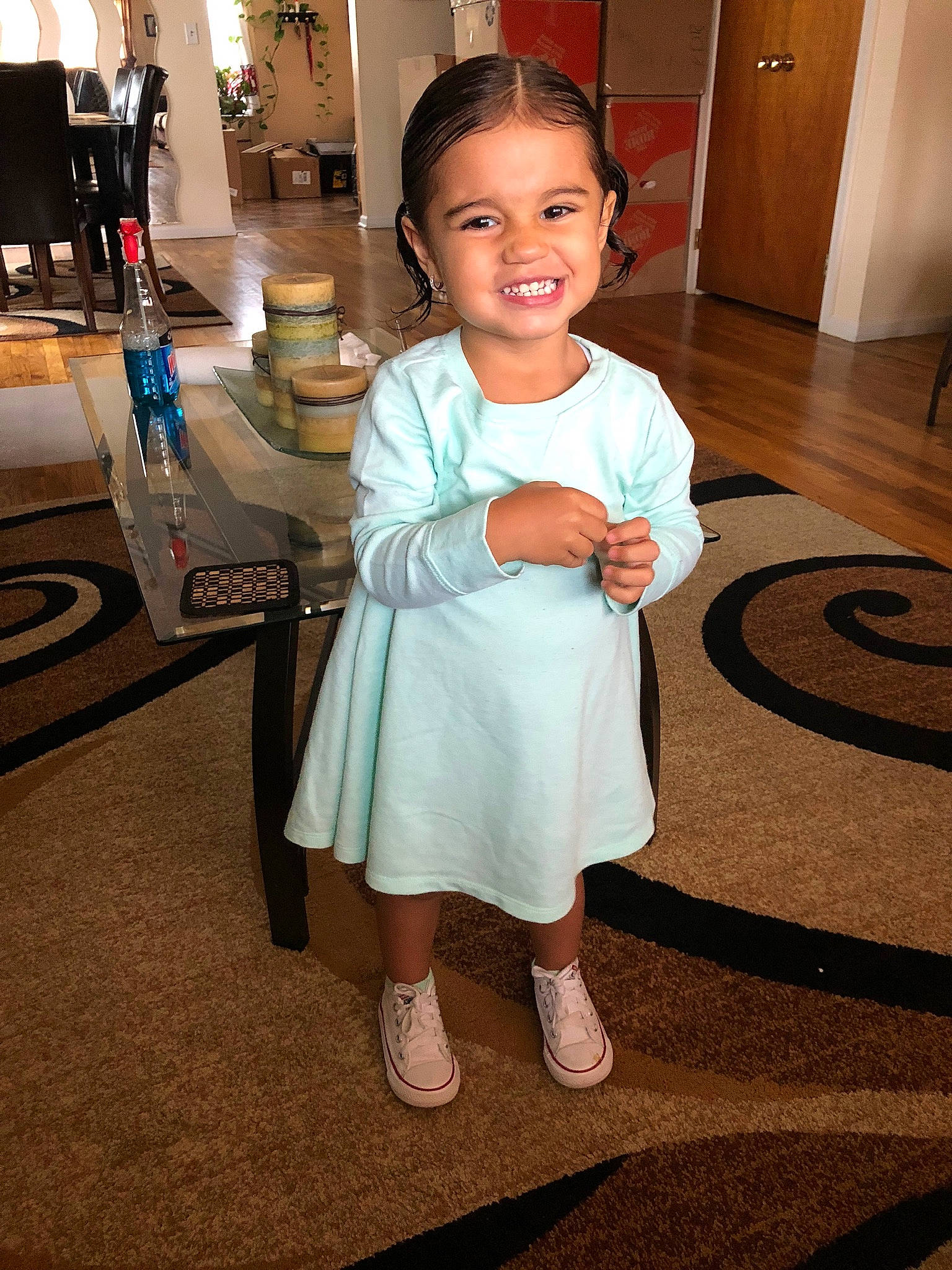 Aiyanna is registered to the contest to win money with this photo: child, costume, floor, flooring, head, joy, person, skin, smile, standing, toddler