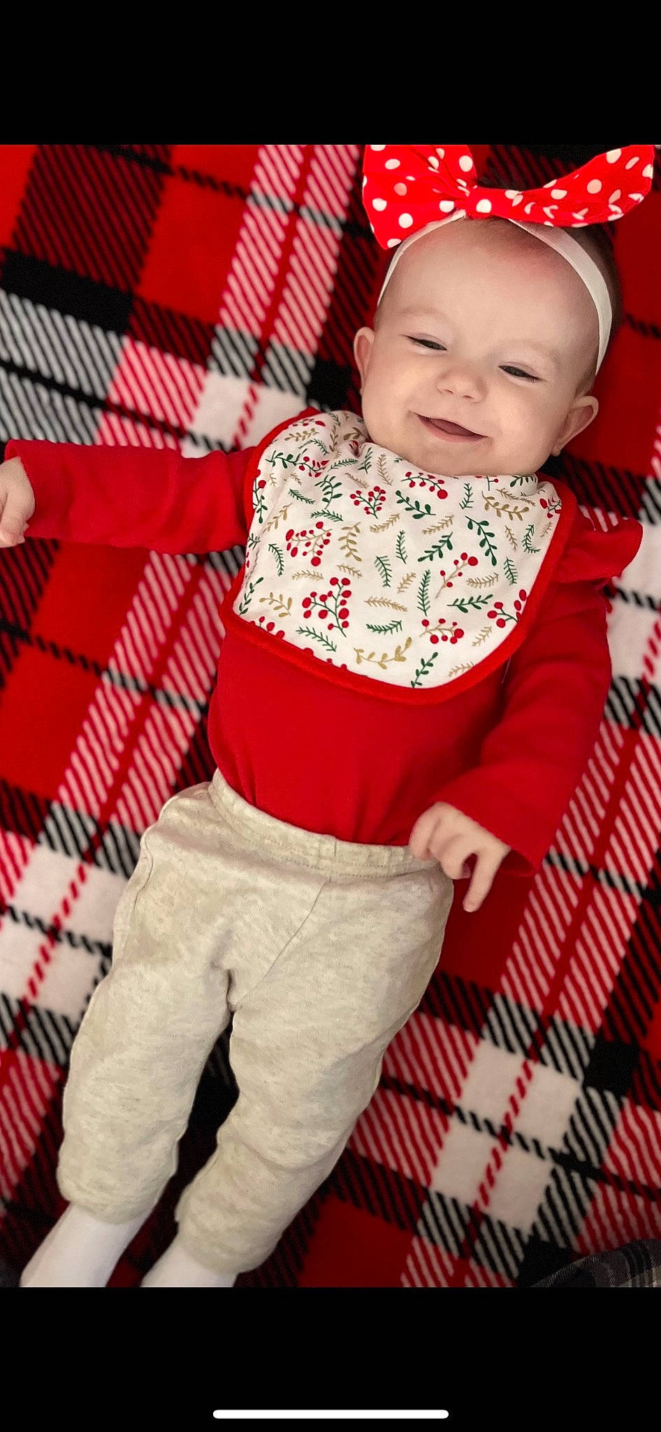Ryleigh is registered to the contest to win money with this photo: baby, baby_toddler_clothing, beauty, child, collar, face, happy, linens, magenta, outerwear, pattern, person, photograph, pink, plaid, red, sleeve, smile, t_shirt, textile