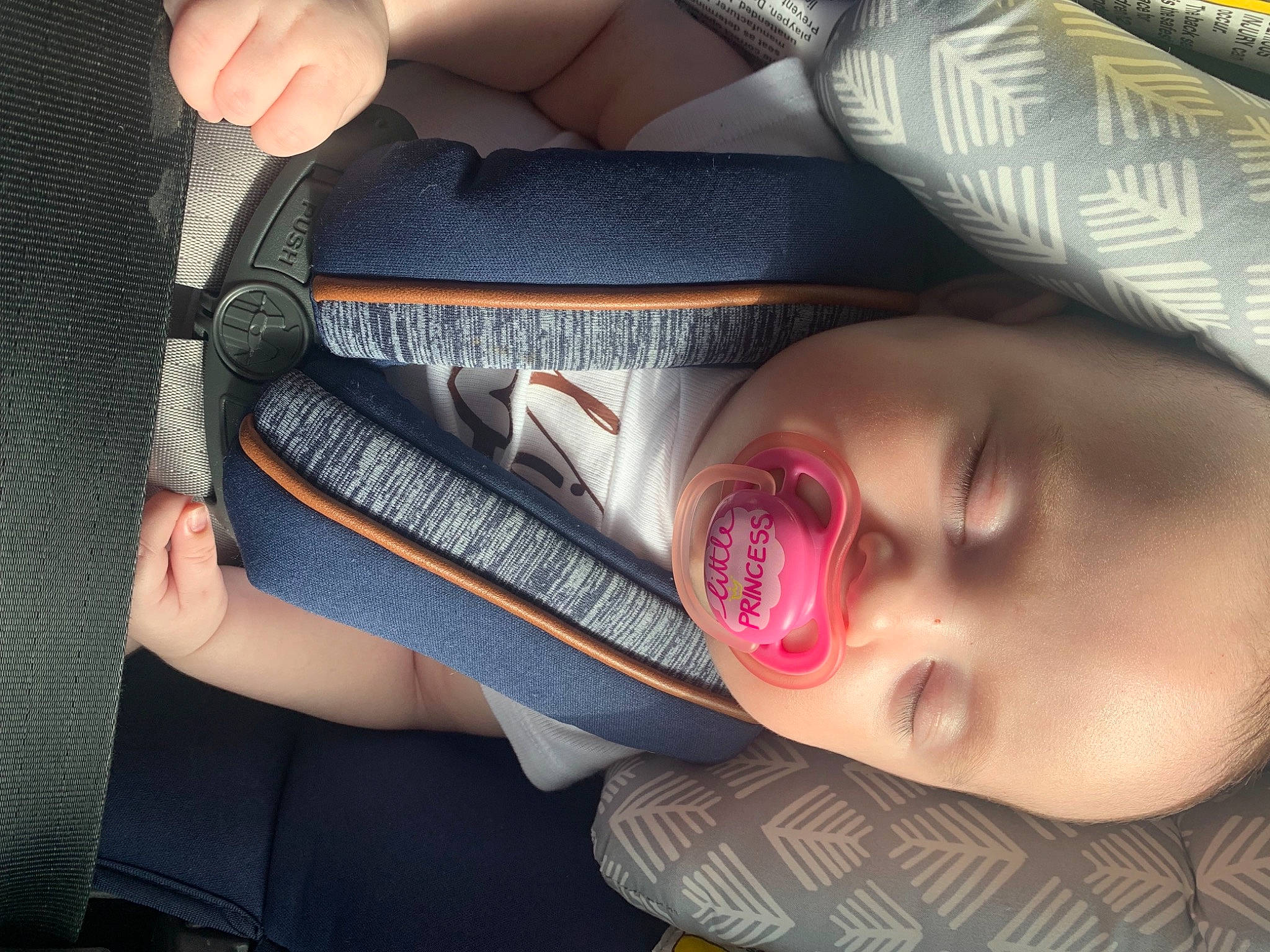 Aurora is registered to the contest to win money with this photo: car_seat, cheek, chest, child, comfort, cool, eyebrow, eyelash, eyewear, finger, gesture, hand, happy, lip, mouth, nail, nose, person, skin, smile